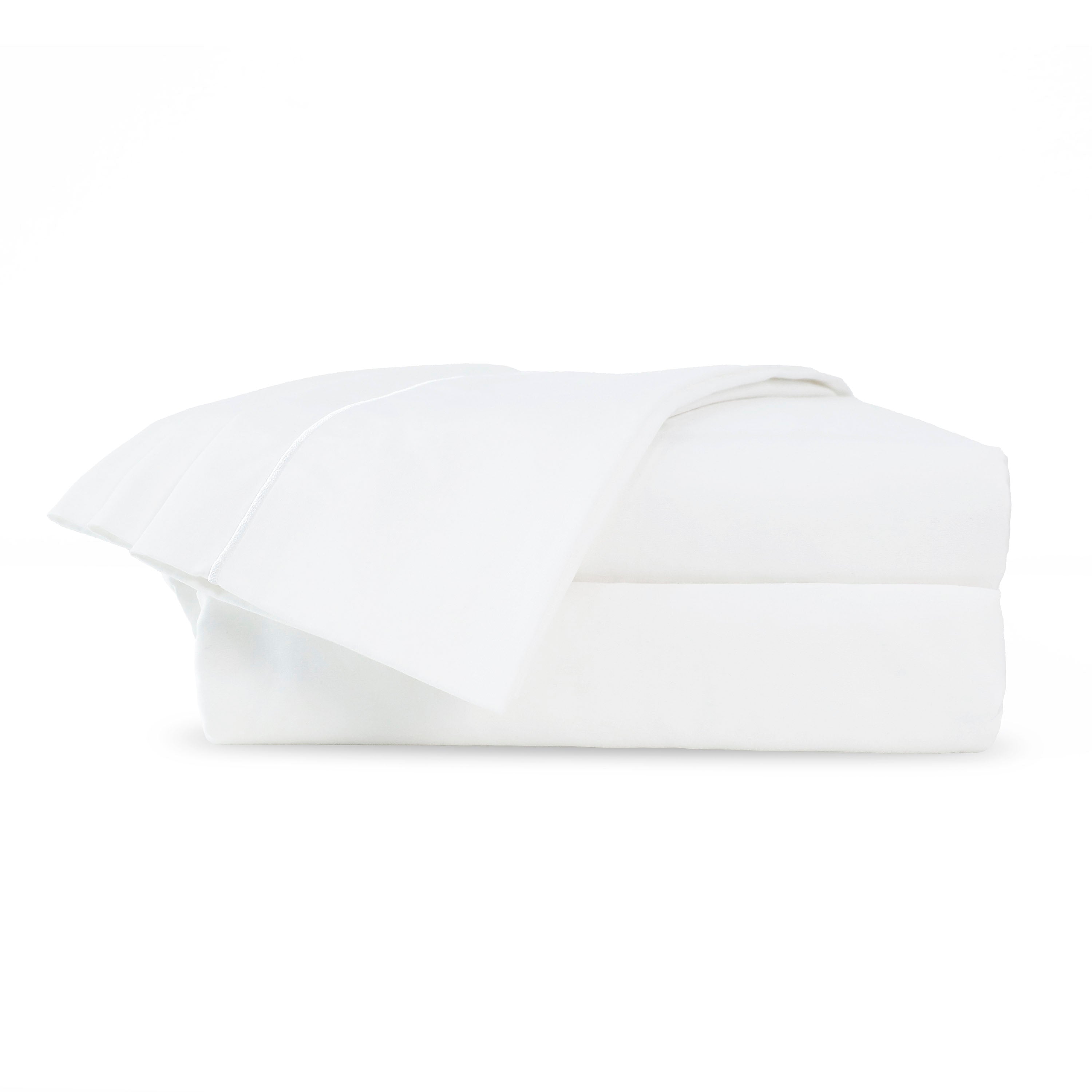 White Supima cotton sheet set folded neatly, featuring a smooth texture and a 700-thread count.