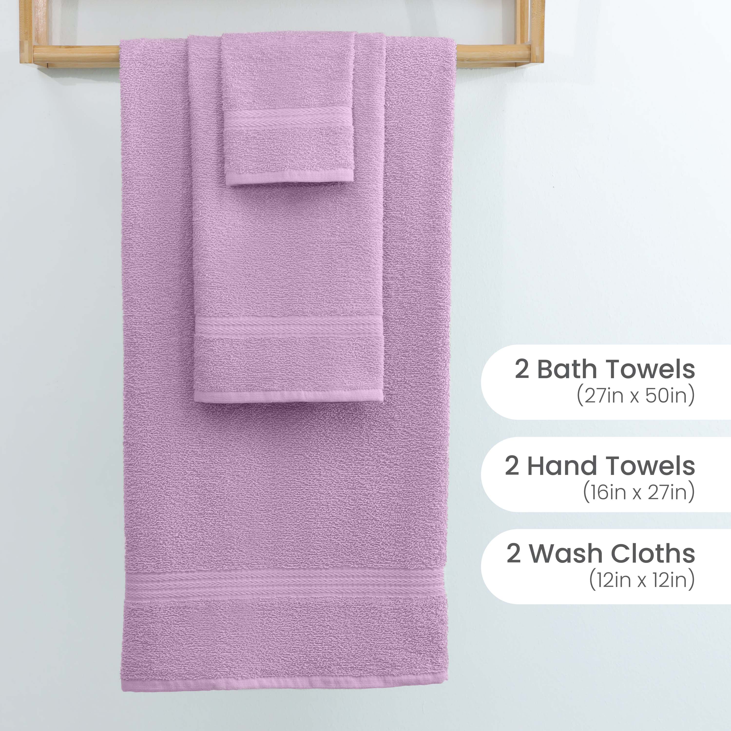 Lavender towels displayed on a rack, including two bath towels, two hand towels, and two washcloths.