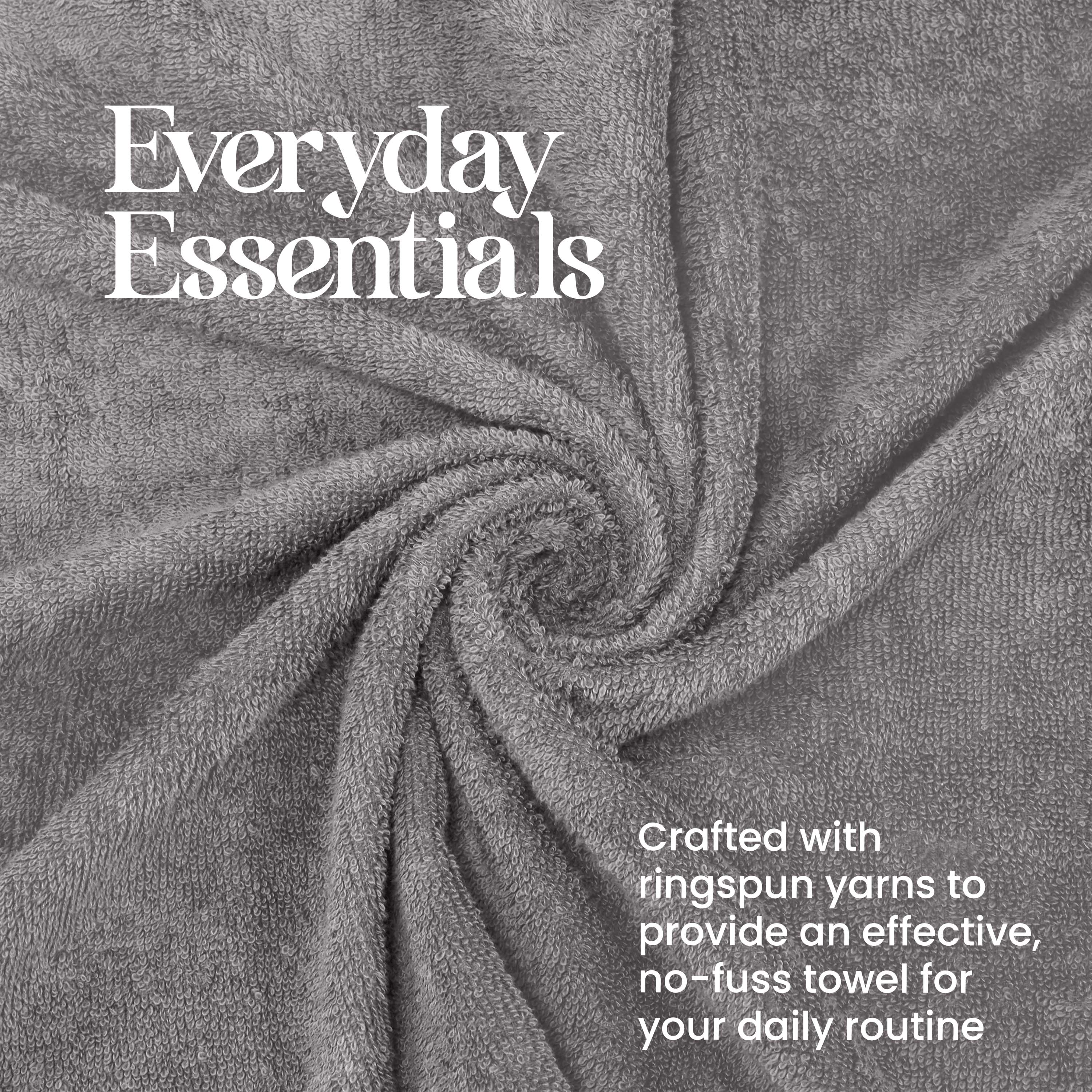 Gray towel with a textured surface, arranged in a spiral pattern.