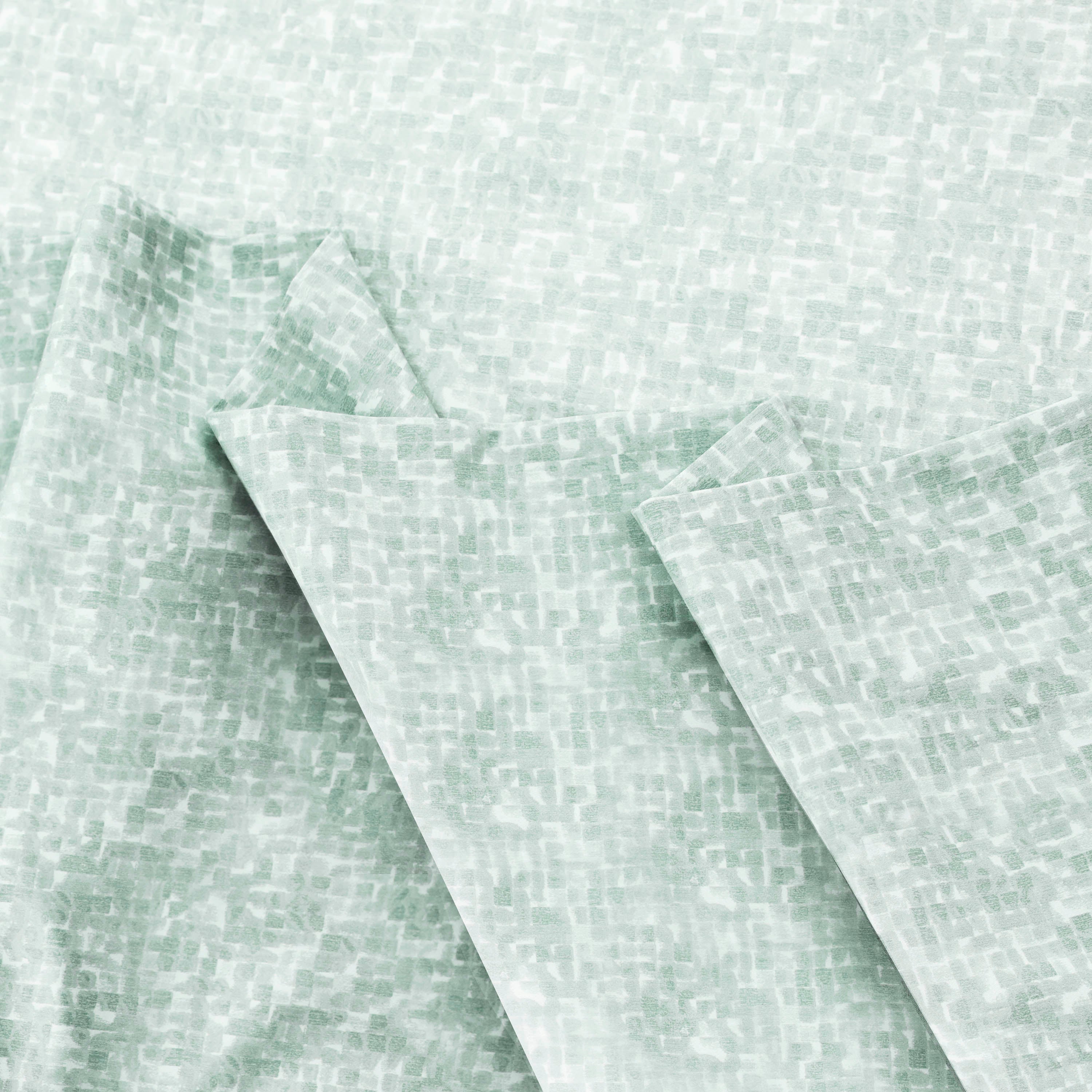 Light green sheet set with a textured, abstract pattern.