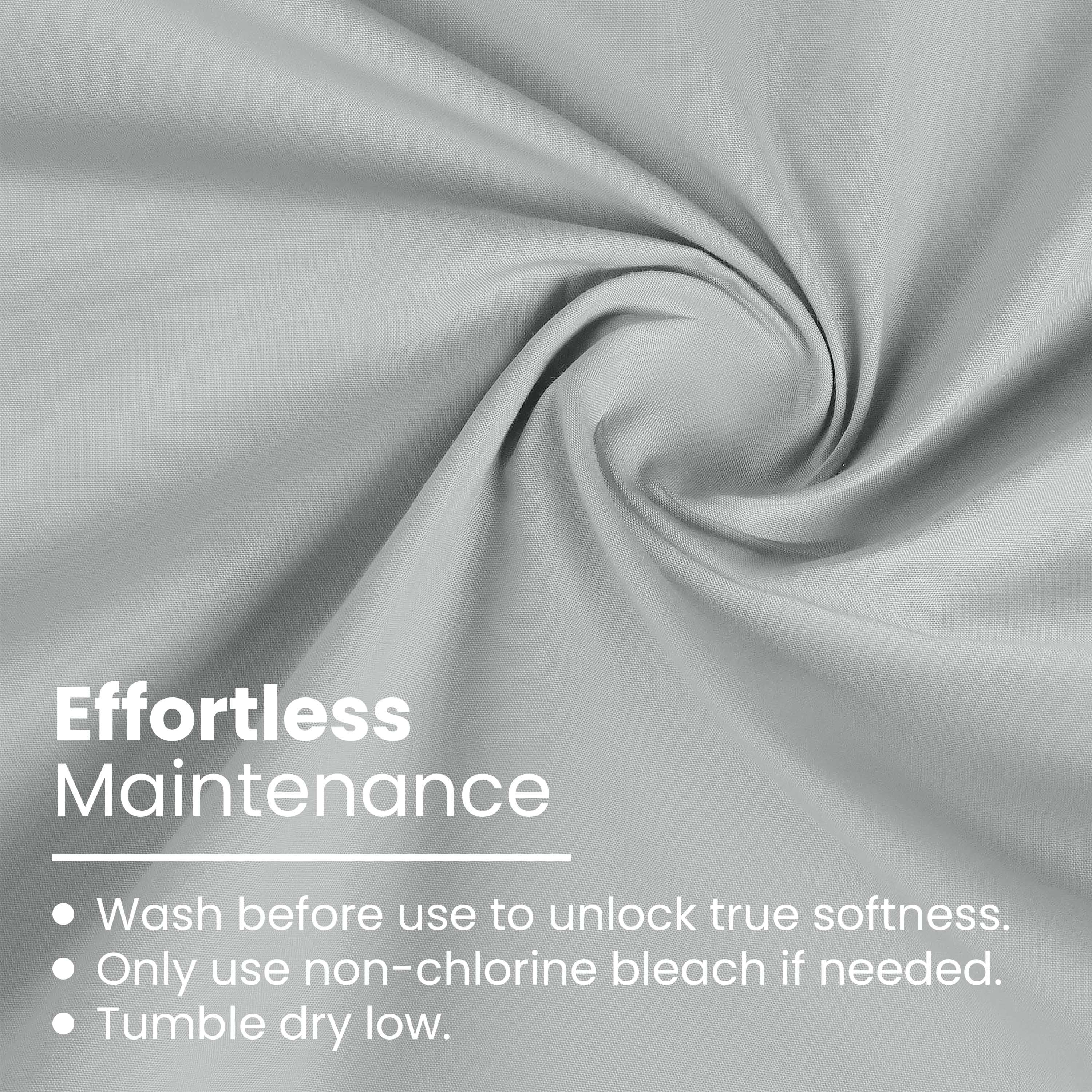 Light gray fabric with a smooth texture, featuring care instructions for maintenance.