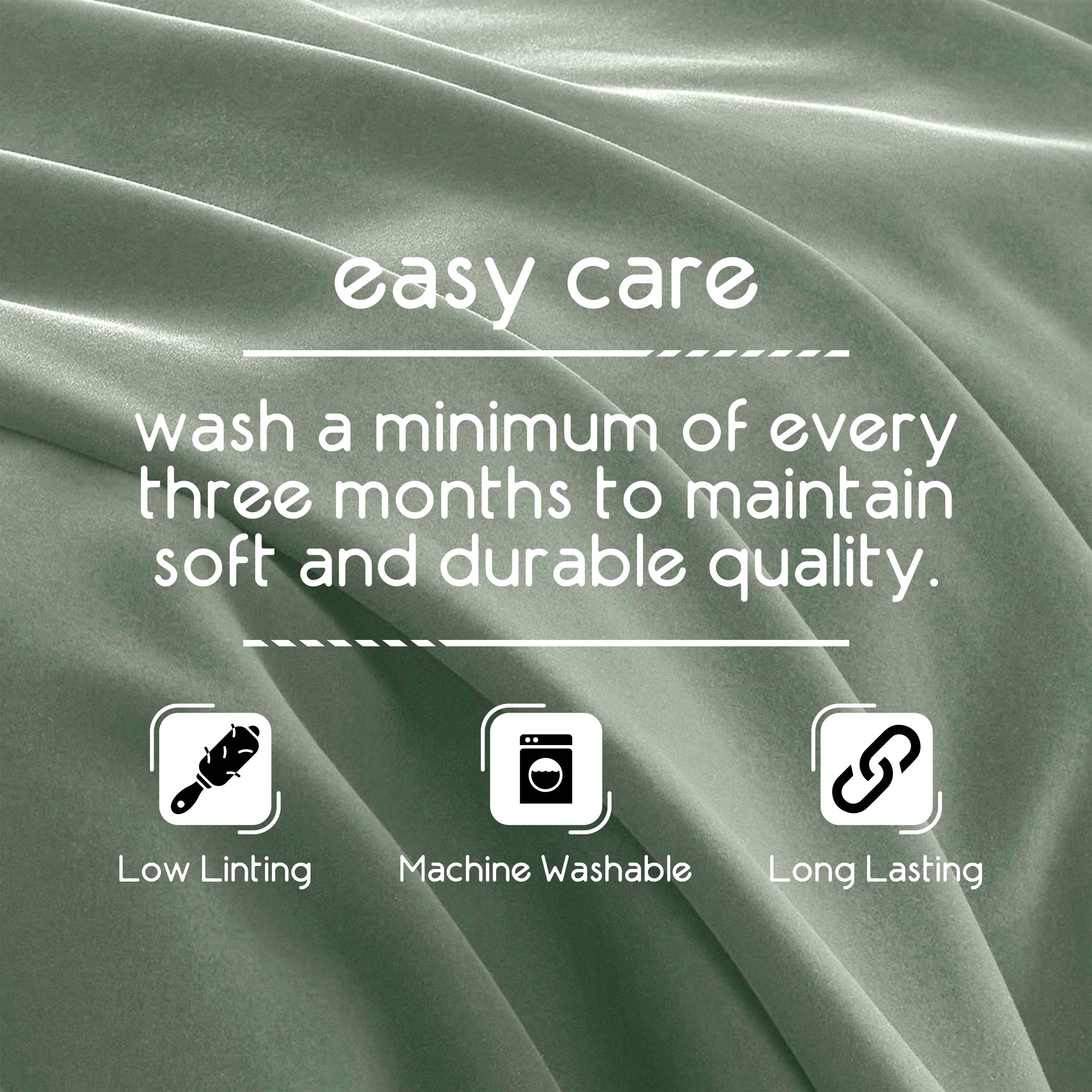 Text on a soft fabric background detailing care instructions for a blanket, emphasizing machine washability and durability.