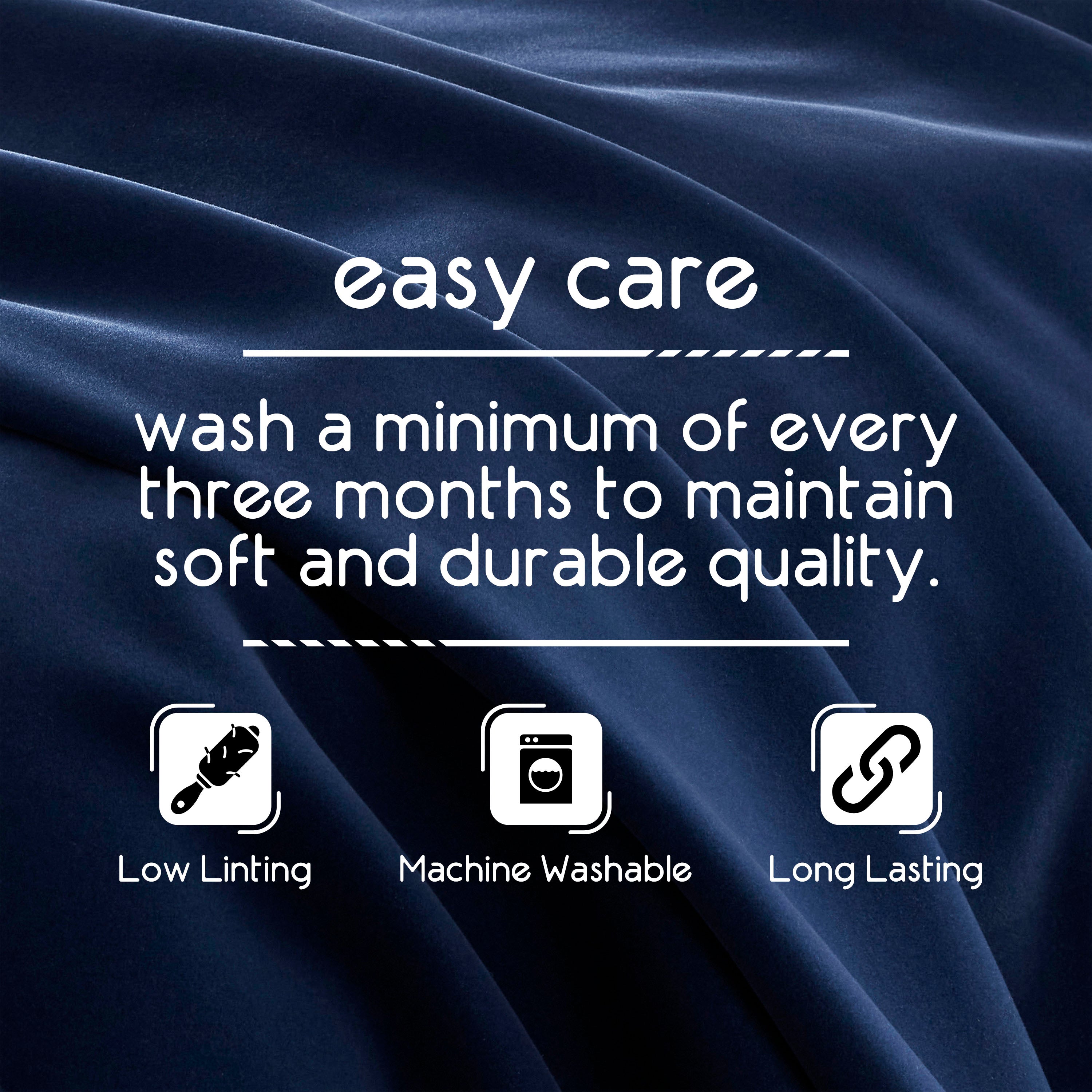 Text on a dark fabric background detailing care instructions for a blanket, emphasizing low lint, machine washability, and du