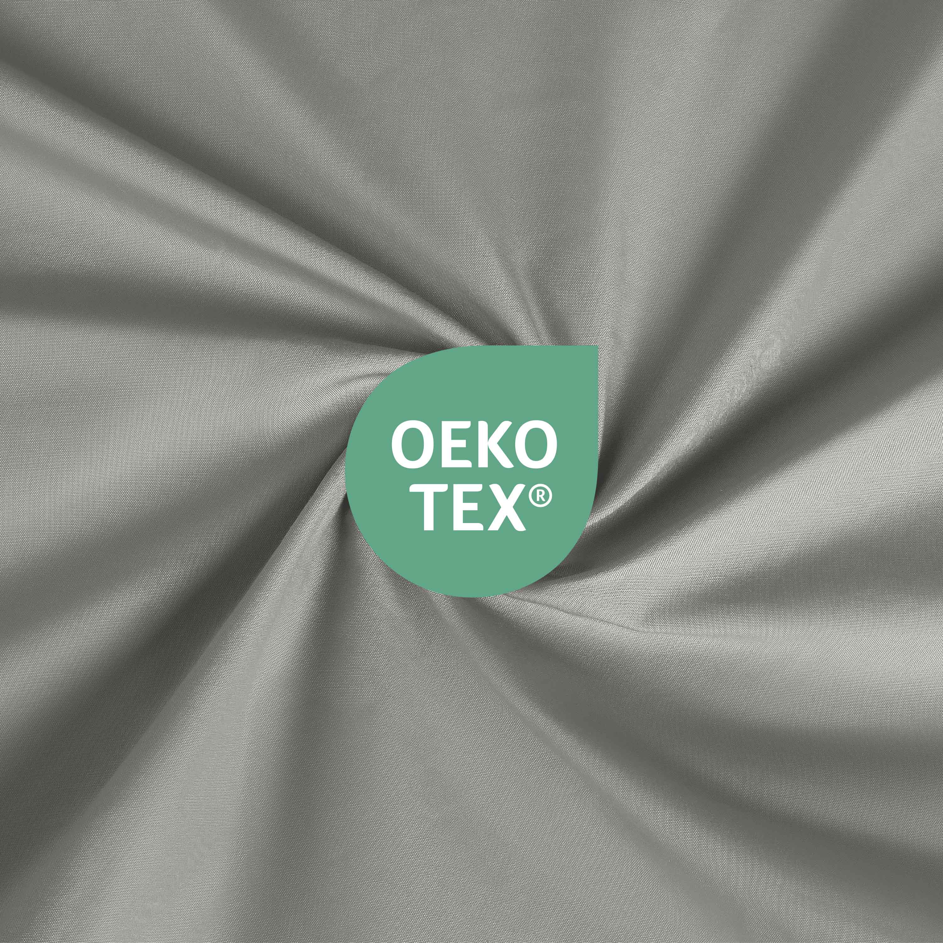 Close-up of gray fabric with an Oeko-Tex certification logo in green.