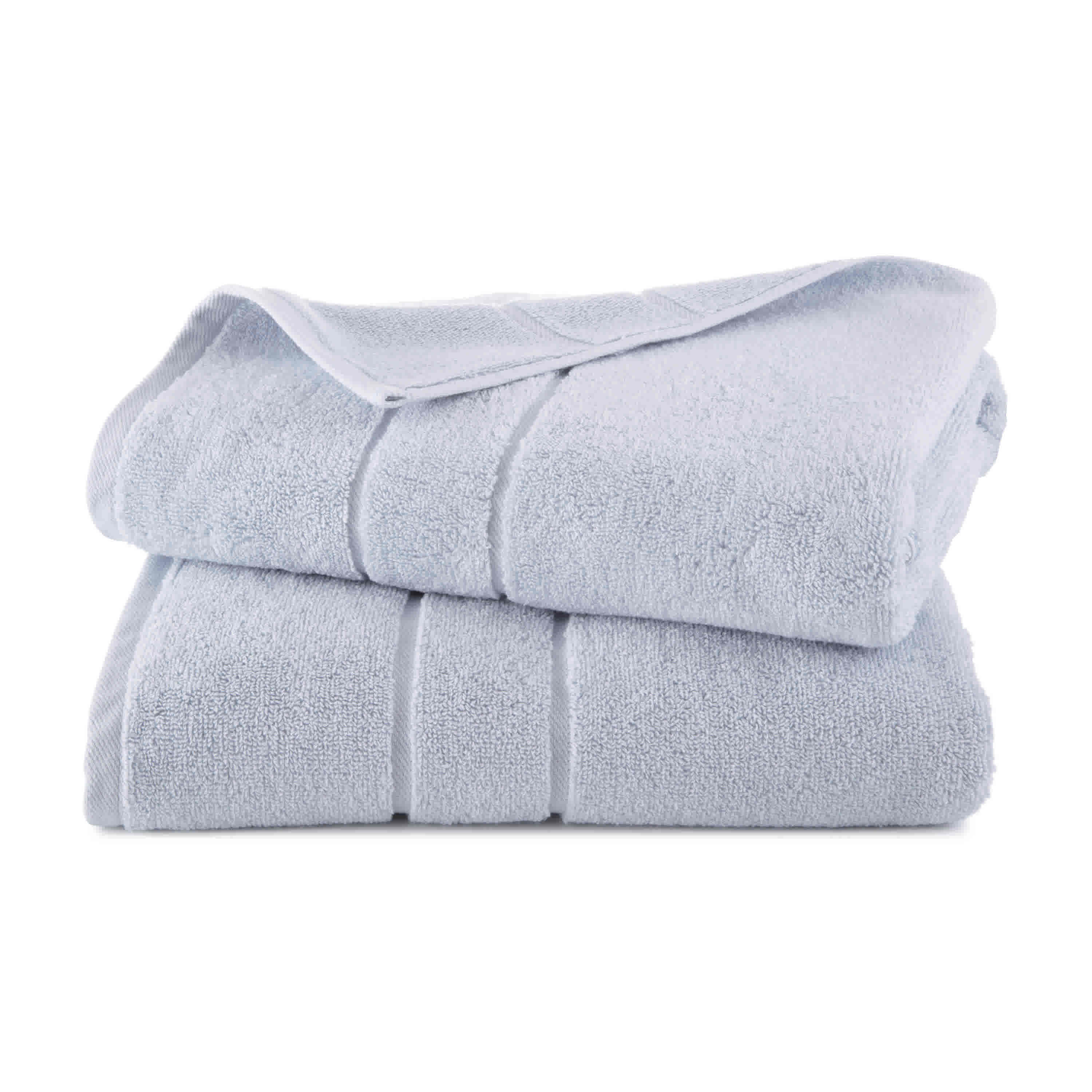 Two stacked bath towels in a light blue color with a textured finish.