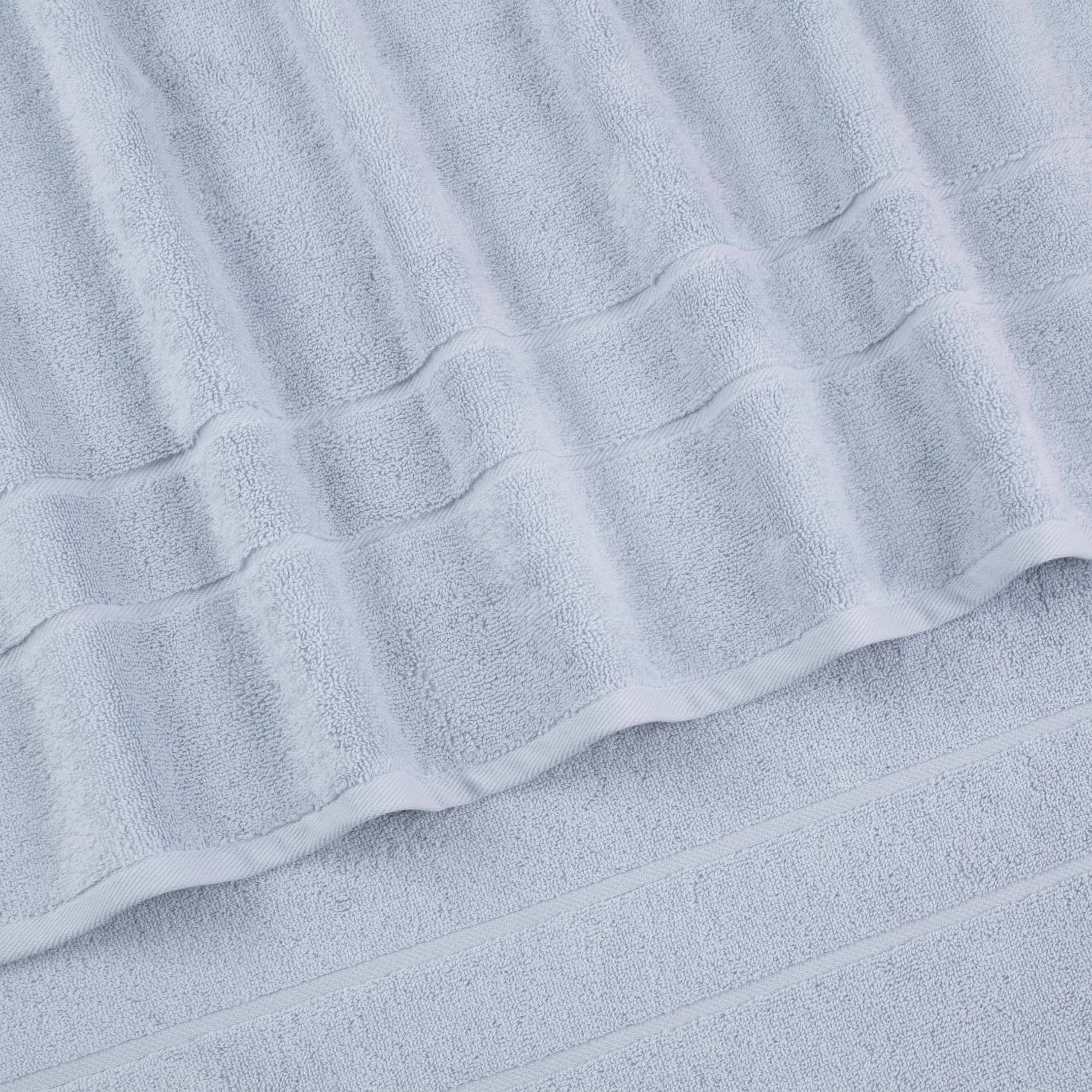 Light gray wash cloths with textured stripes and a soft, absorbent fabric.