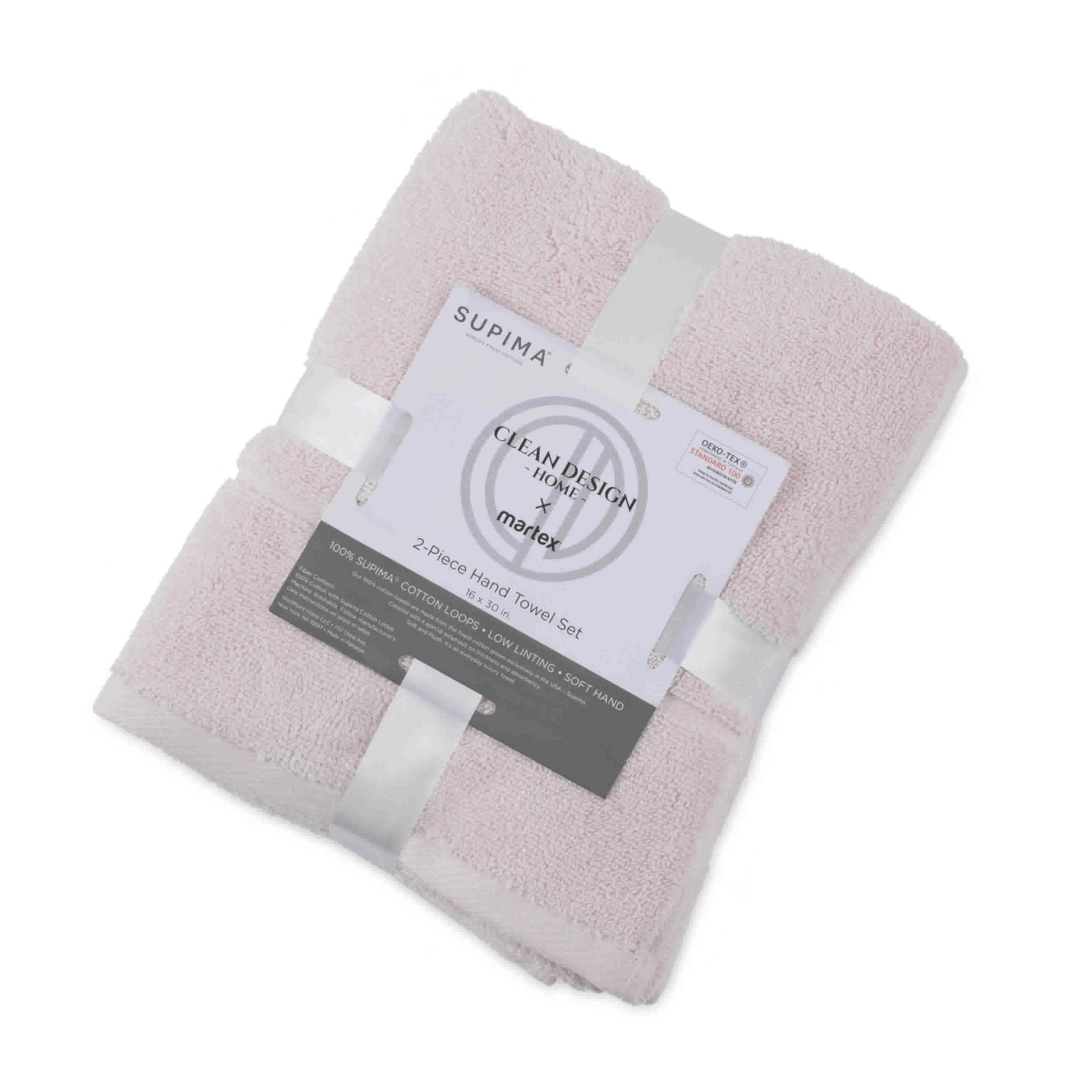 Two soft pink hand towels neatly stacked and wrapped with a label detailing product information.