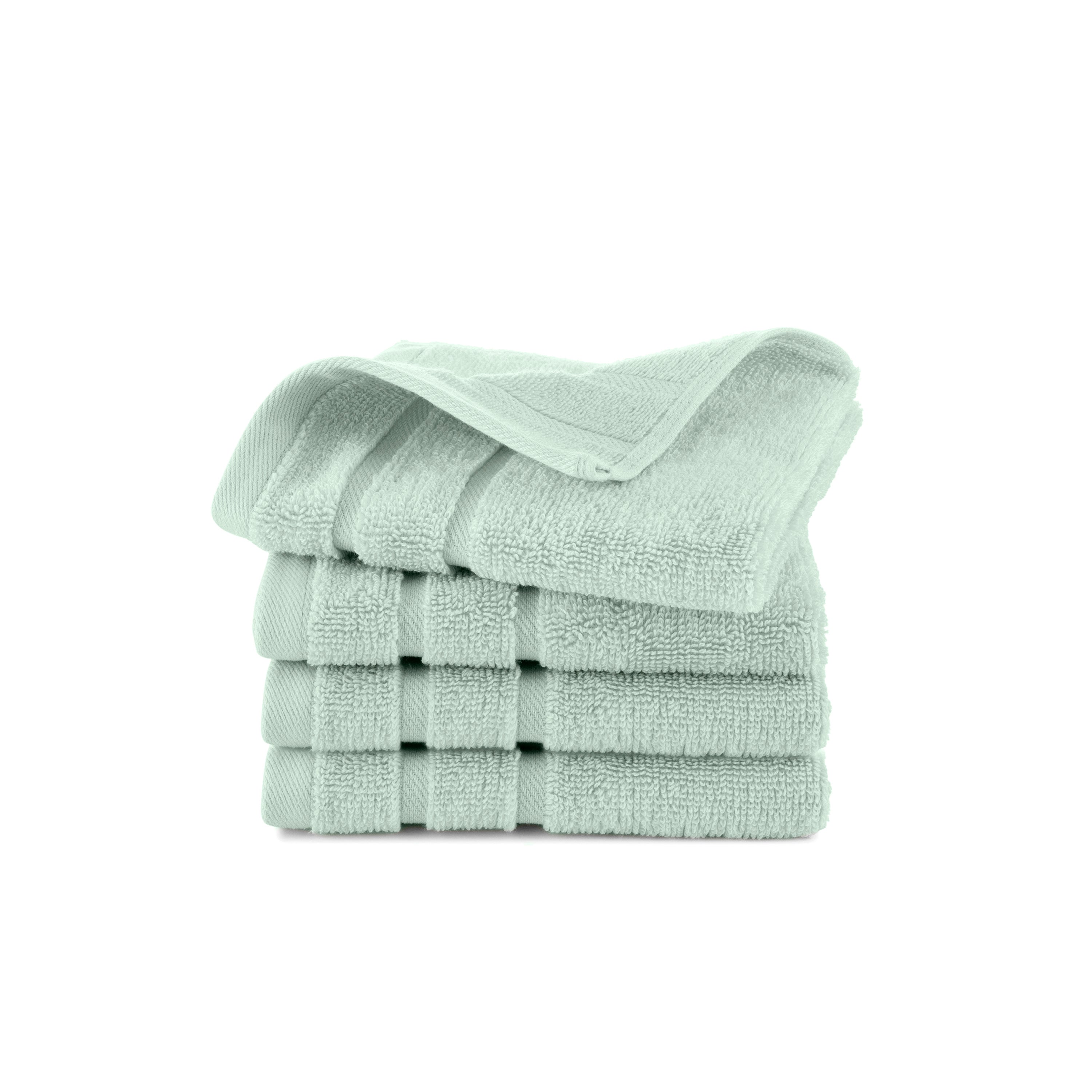 Four stacked wash cloths in a soft mint green color with a textured surface.