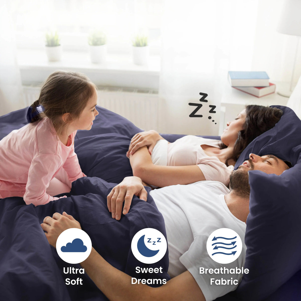 Parent sleeping on a navy bedding