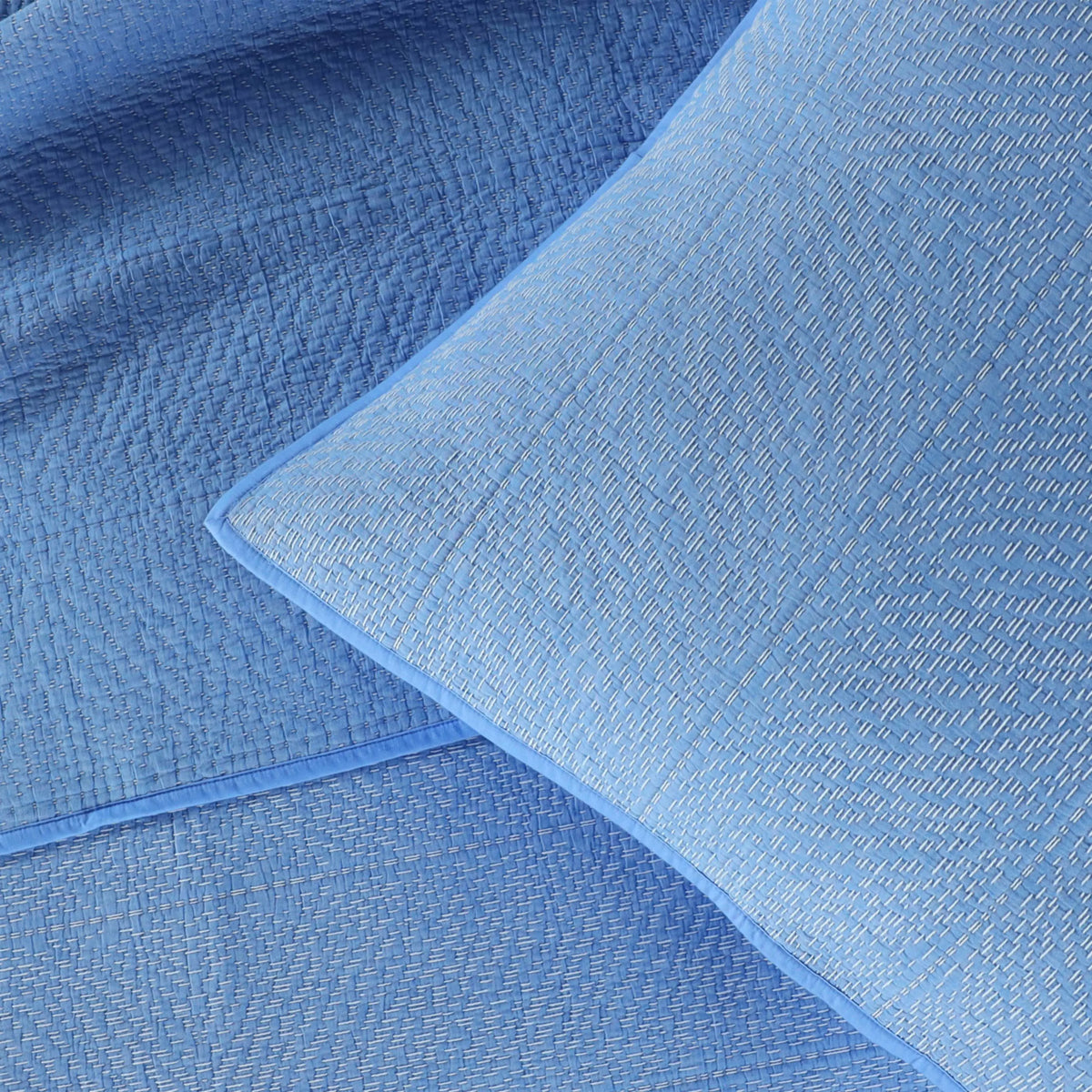 Close up of blue fabric.