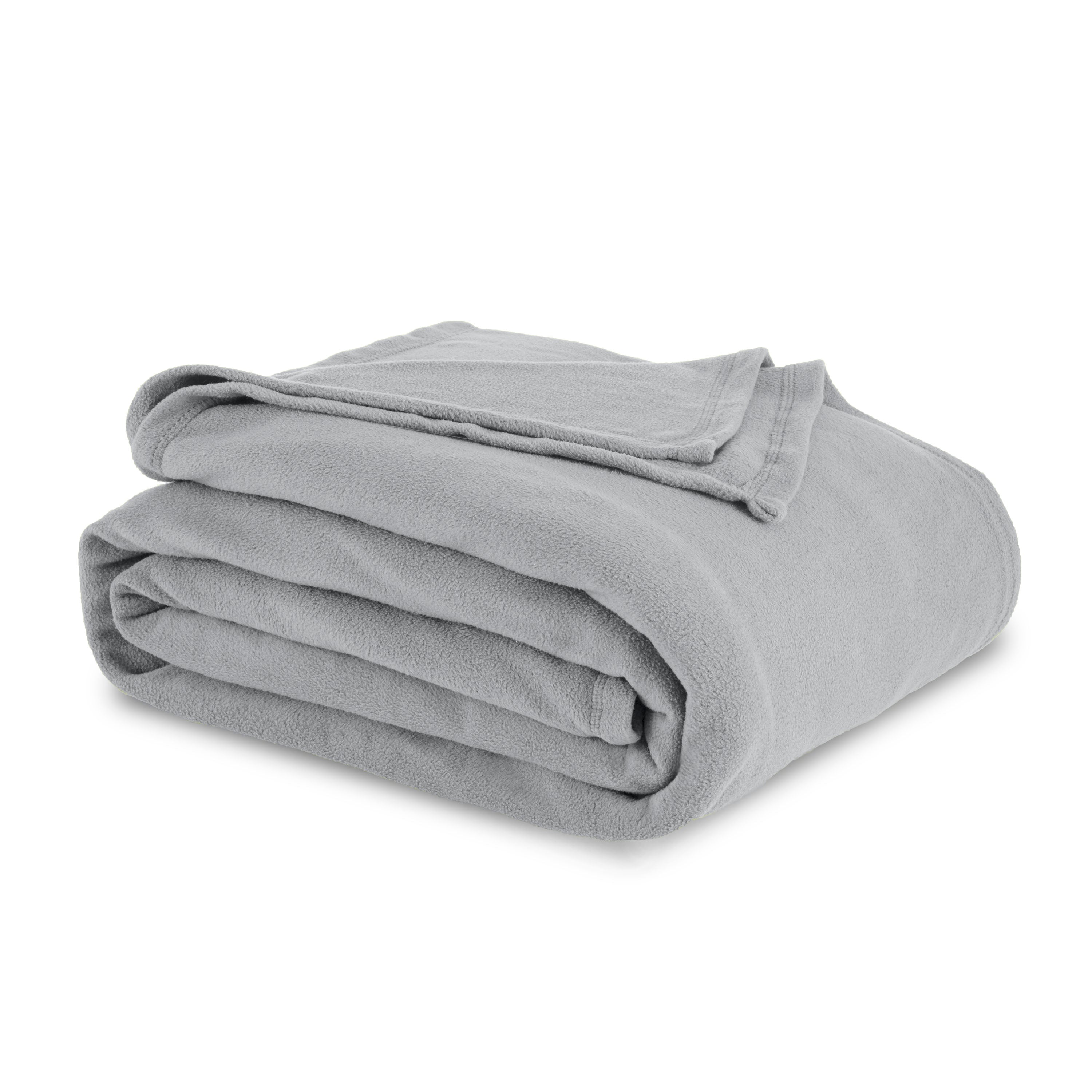 Gray micro fleece blanket neatly folded with a smooth texture.