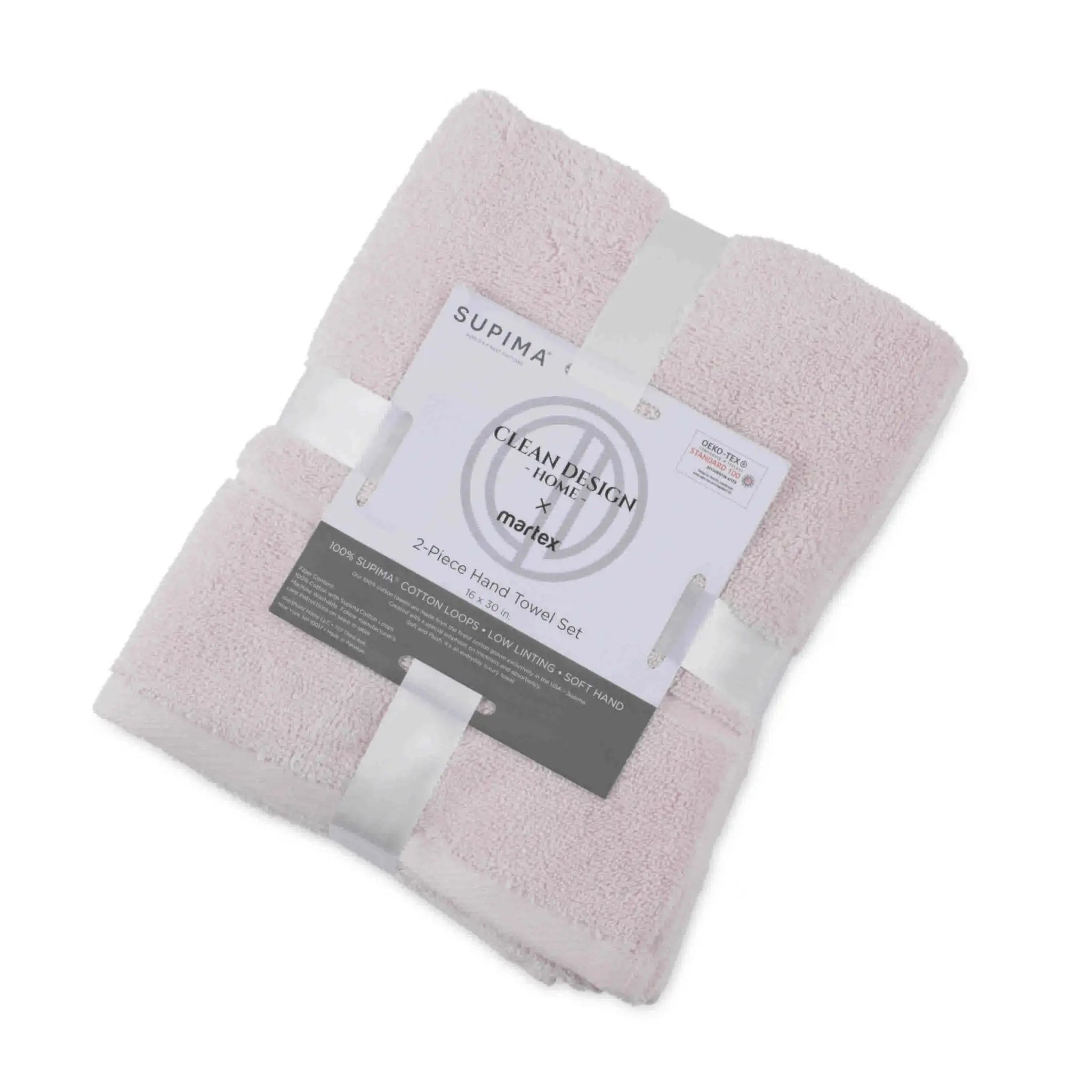 A folded set of two blush terry hand towels wrapped in white ribbons with a paper label that reads 'SUPIMA' and 'Clean Design by Martex'.