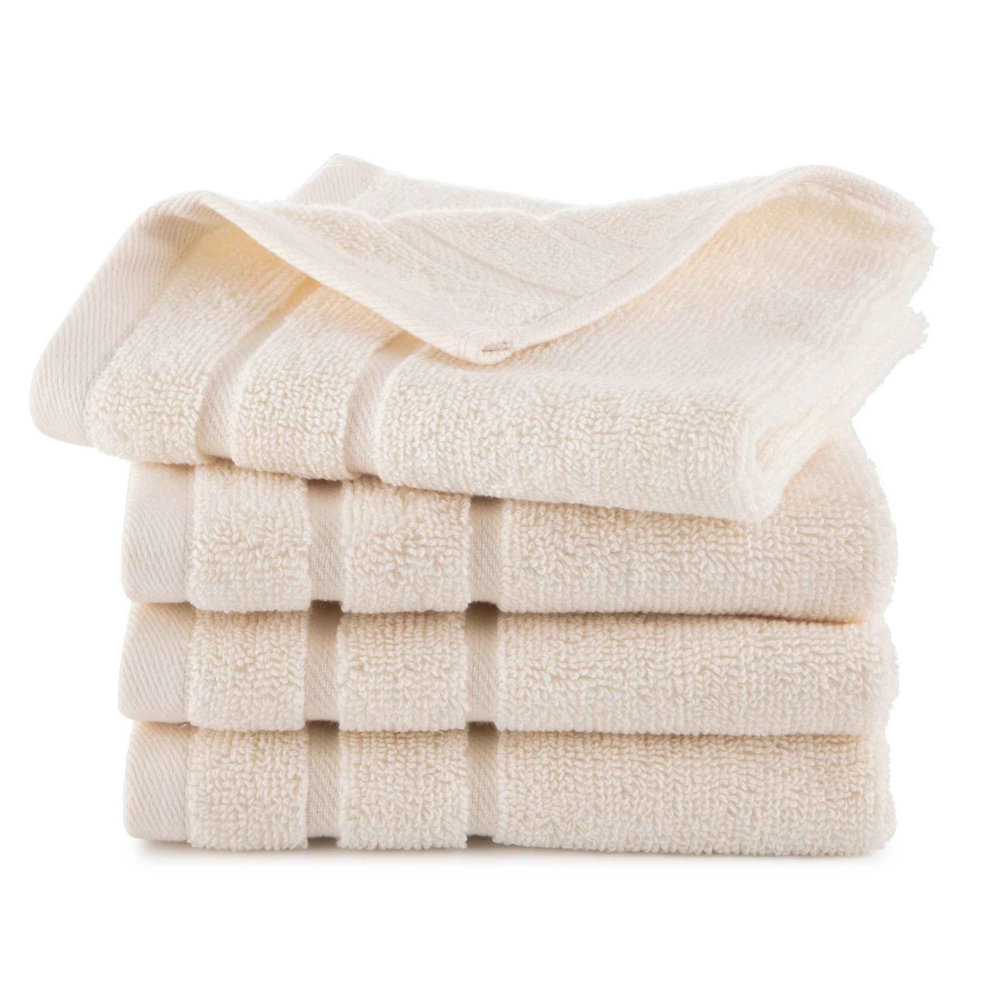 Stack of ivory washcloth on a white background