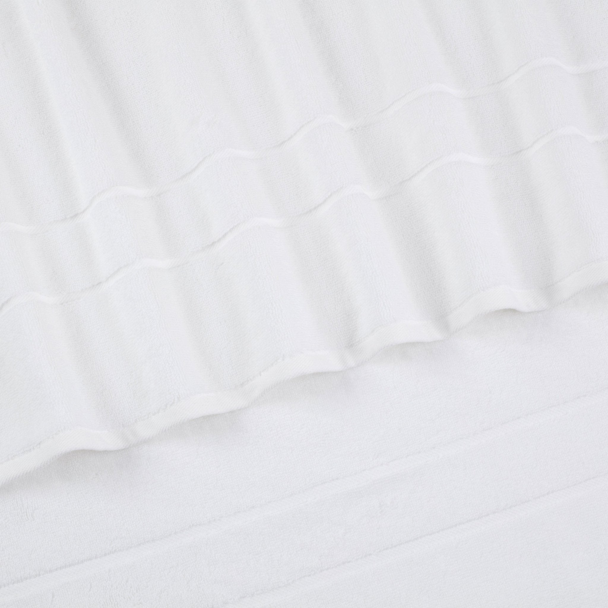 White closeup quilted fabric texture
