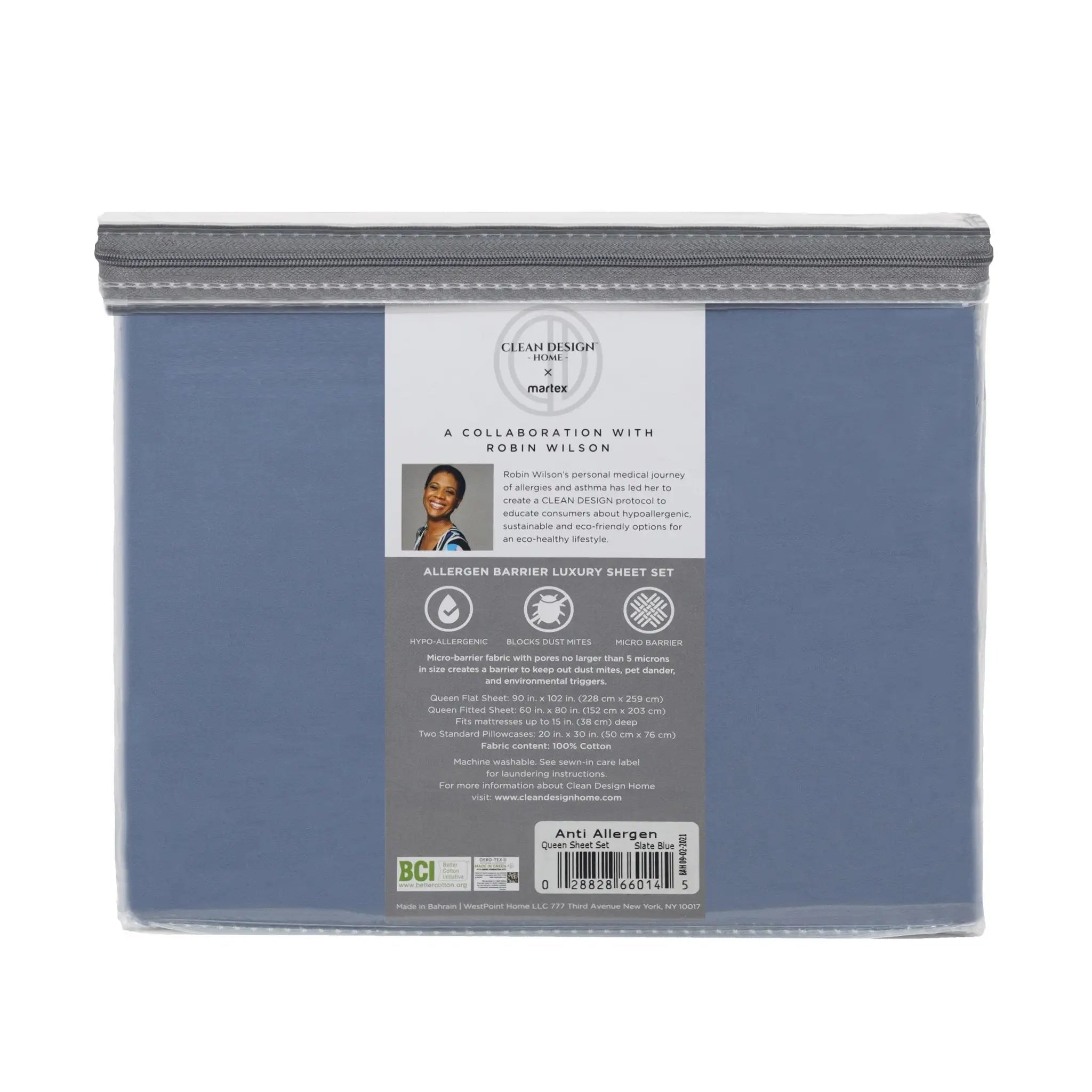 A packaged bedding set in a clear plastic sleeve, showing a dusty blue sheet with a gray fitted sheet on top. The front has a large white and gray product information label with a photo of Robin Wilson and text for 'Clean Design by nature' and 'Allergen Barrier Luxury Sheet Set'.