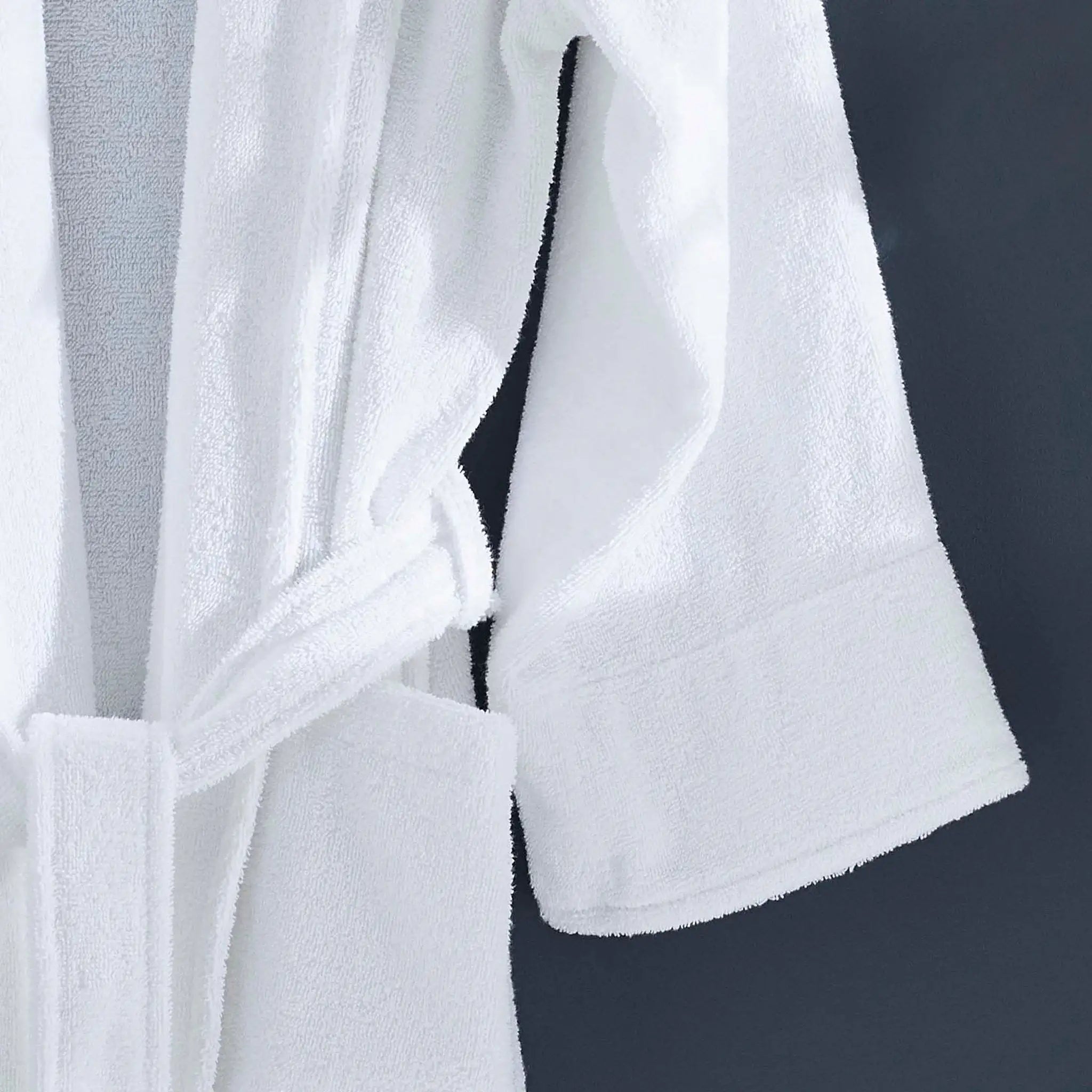 White bathrobe on a dark background