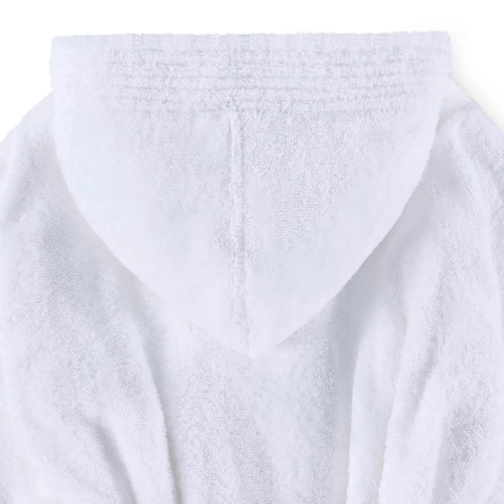 Close-up of a white plush hooded bathrobe fabric, showing the soft terry texture and hood opening against a plain white background.