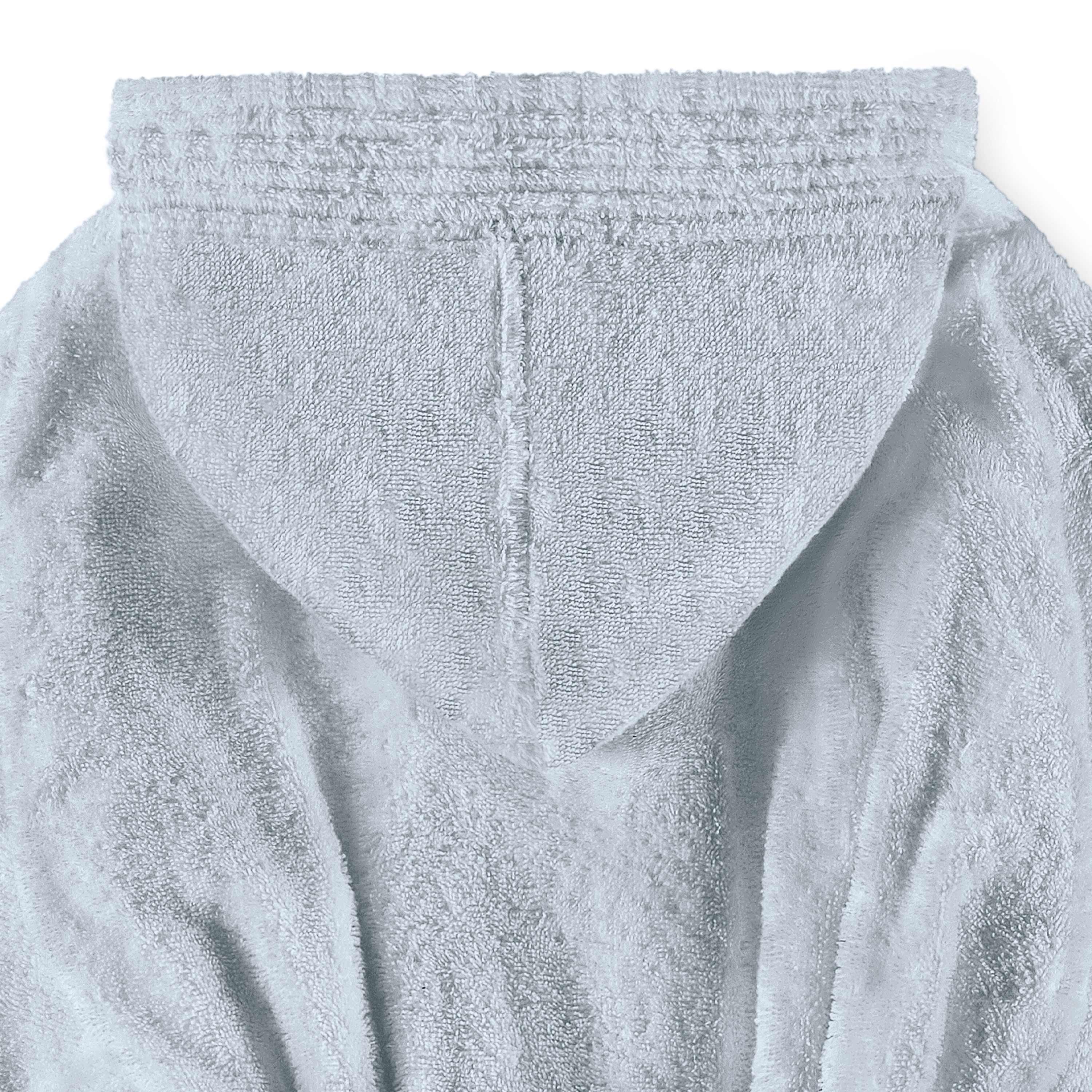 Light blue hooded bath robe with textured fabric and a simple design.