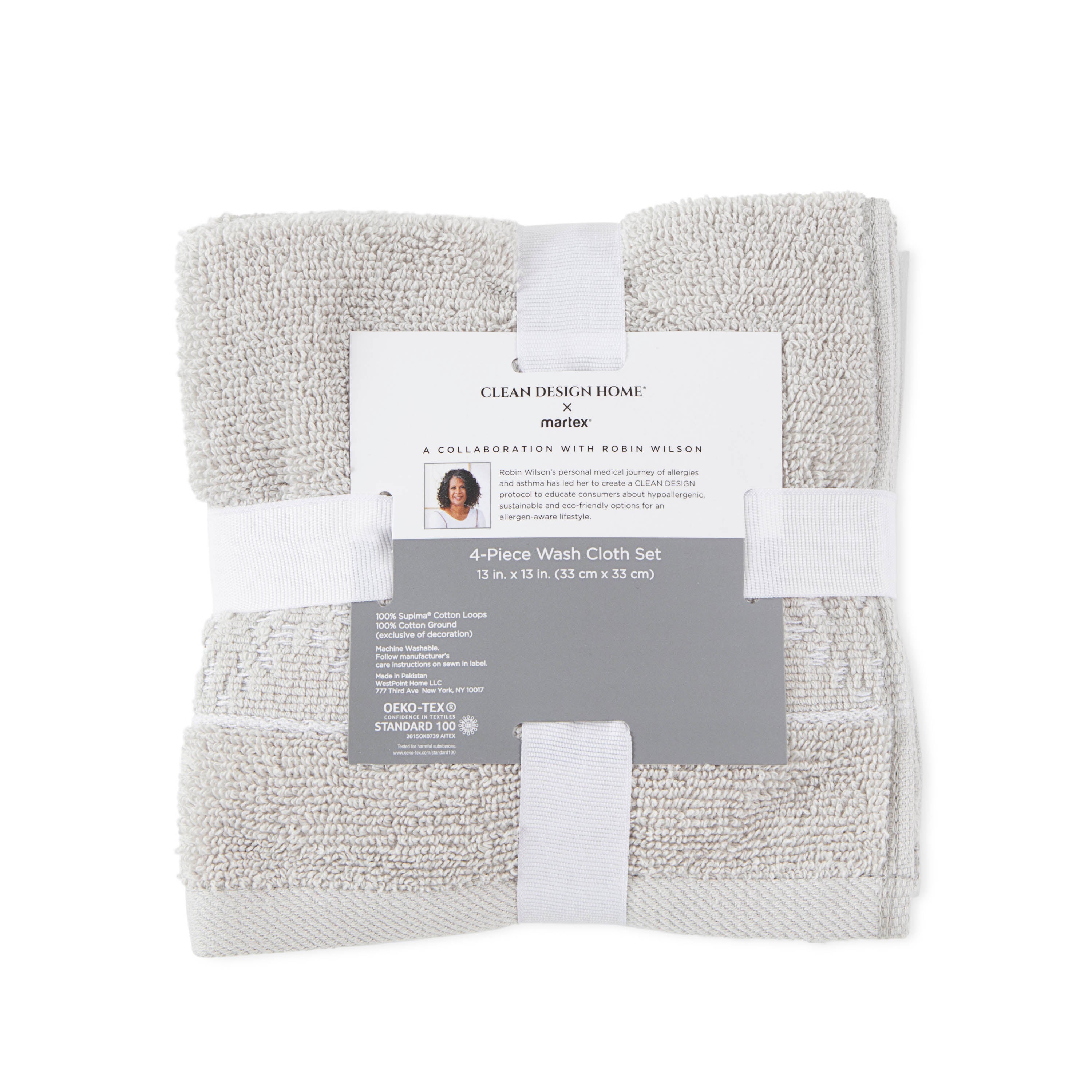 Four-piece wash cloth set in light gray, featuring a label with product details and care instructions.