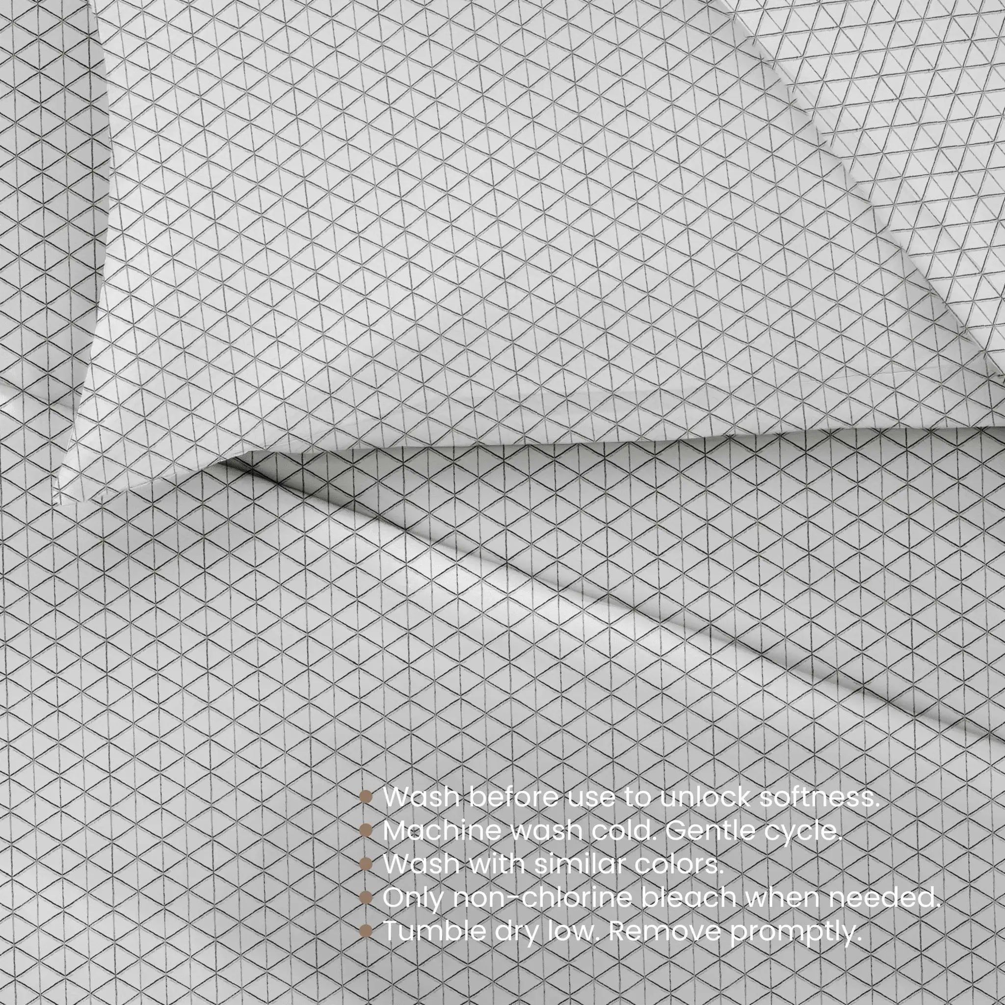 Textured fabric with a geometric pattern and care instructions.