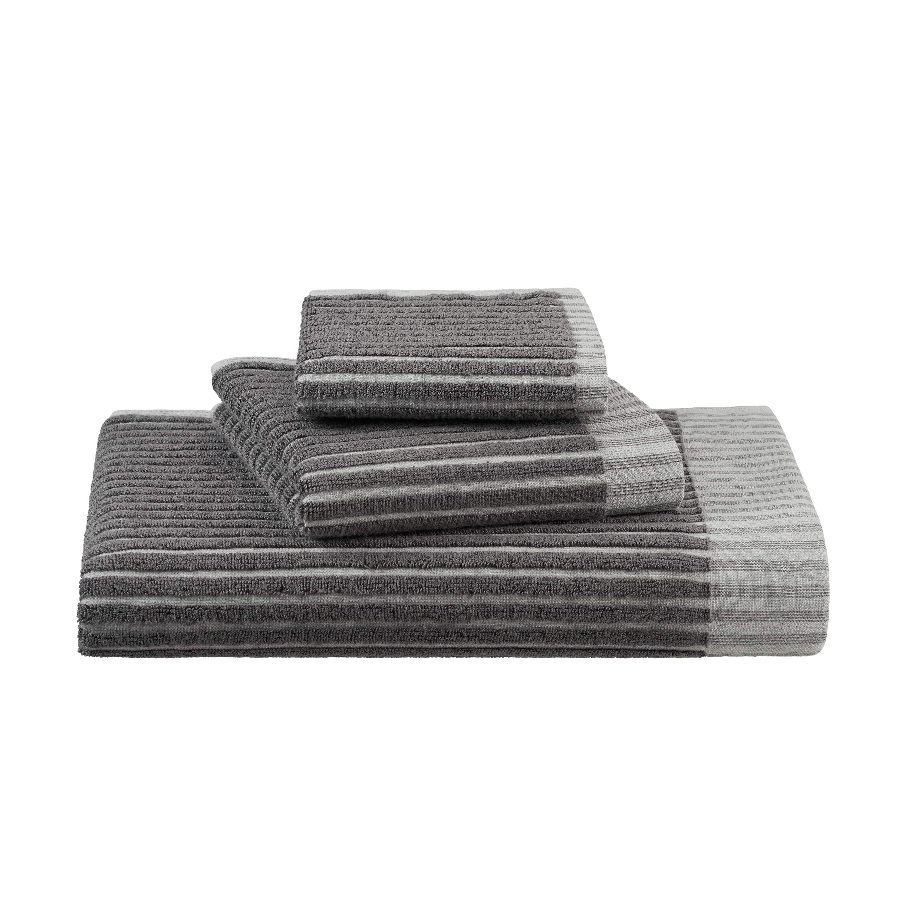 Set of four towels in dark gray with sculpted stripe design in lighter gray.