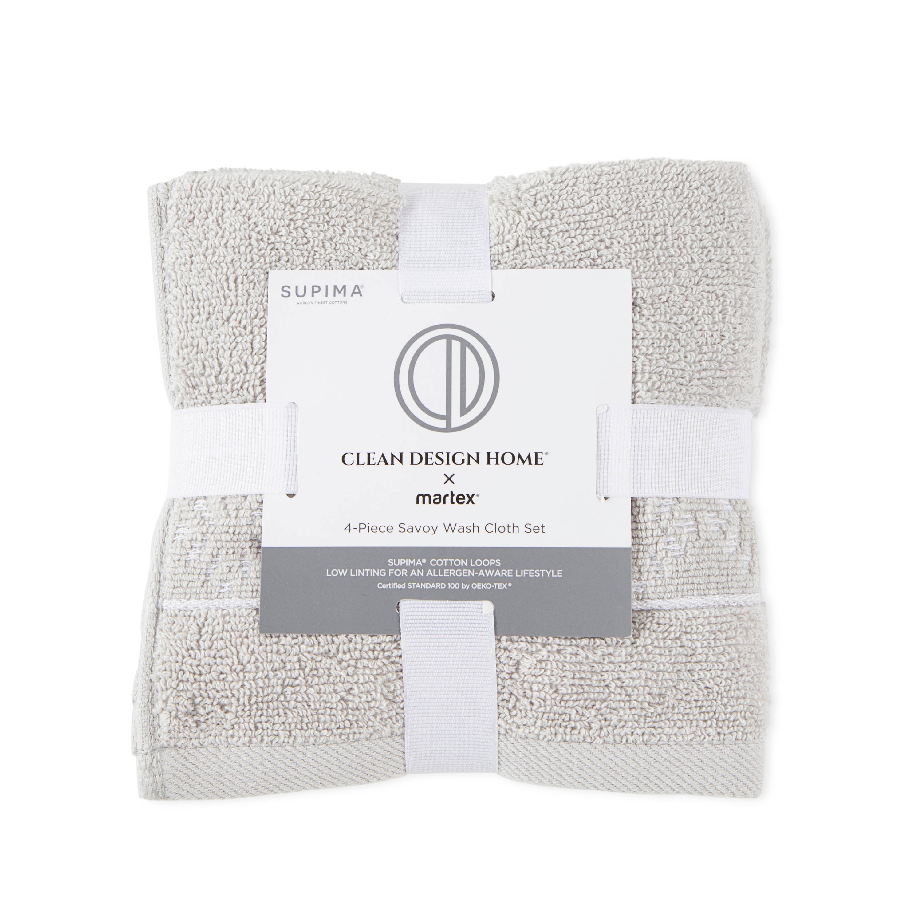 Four-piece set of light gray washcloths with a label detailing product information.