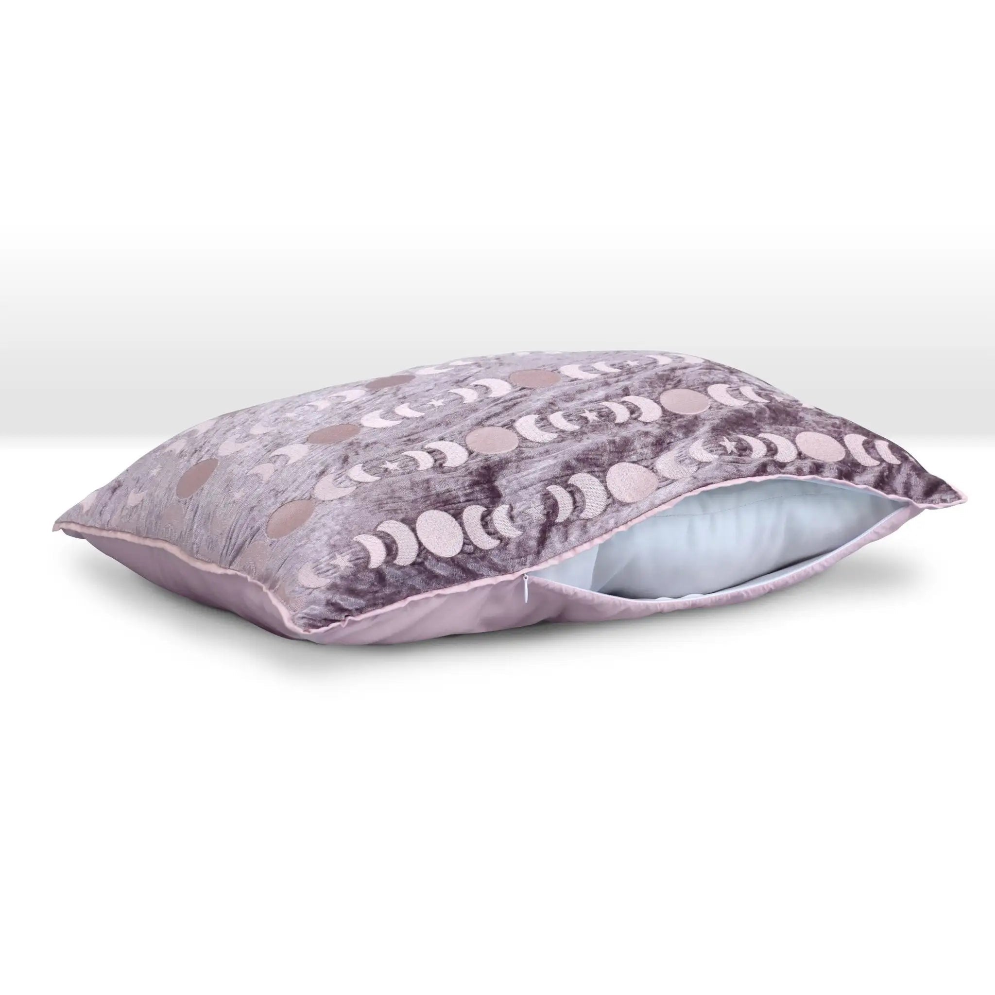 Decorative pillow with a moon phase pattern on a white background