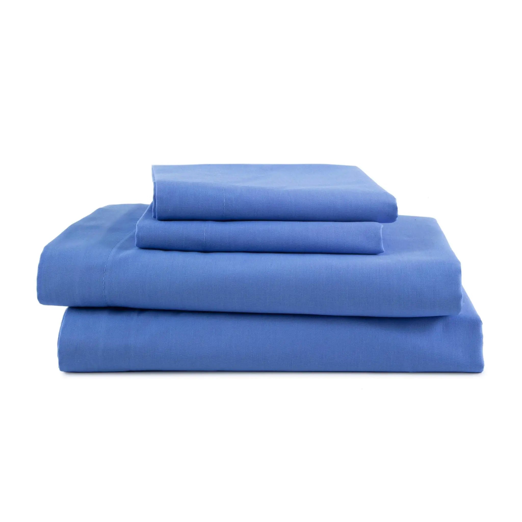 Set of blue bed sheets and pillowcases on a white background