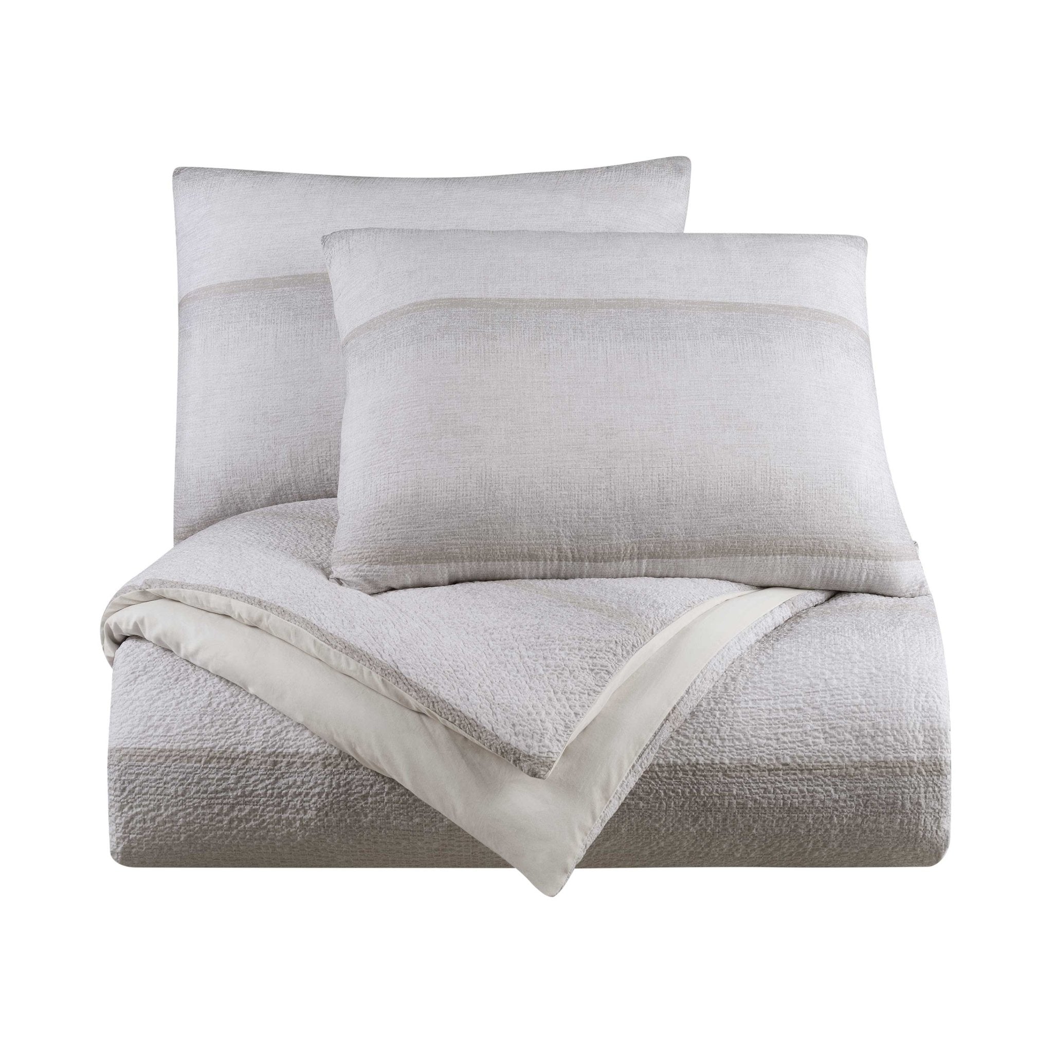 Gray textured comforter set with pillow shams on a white background