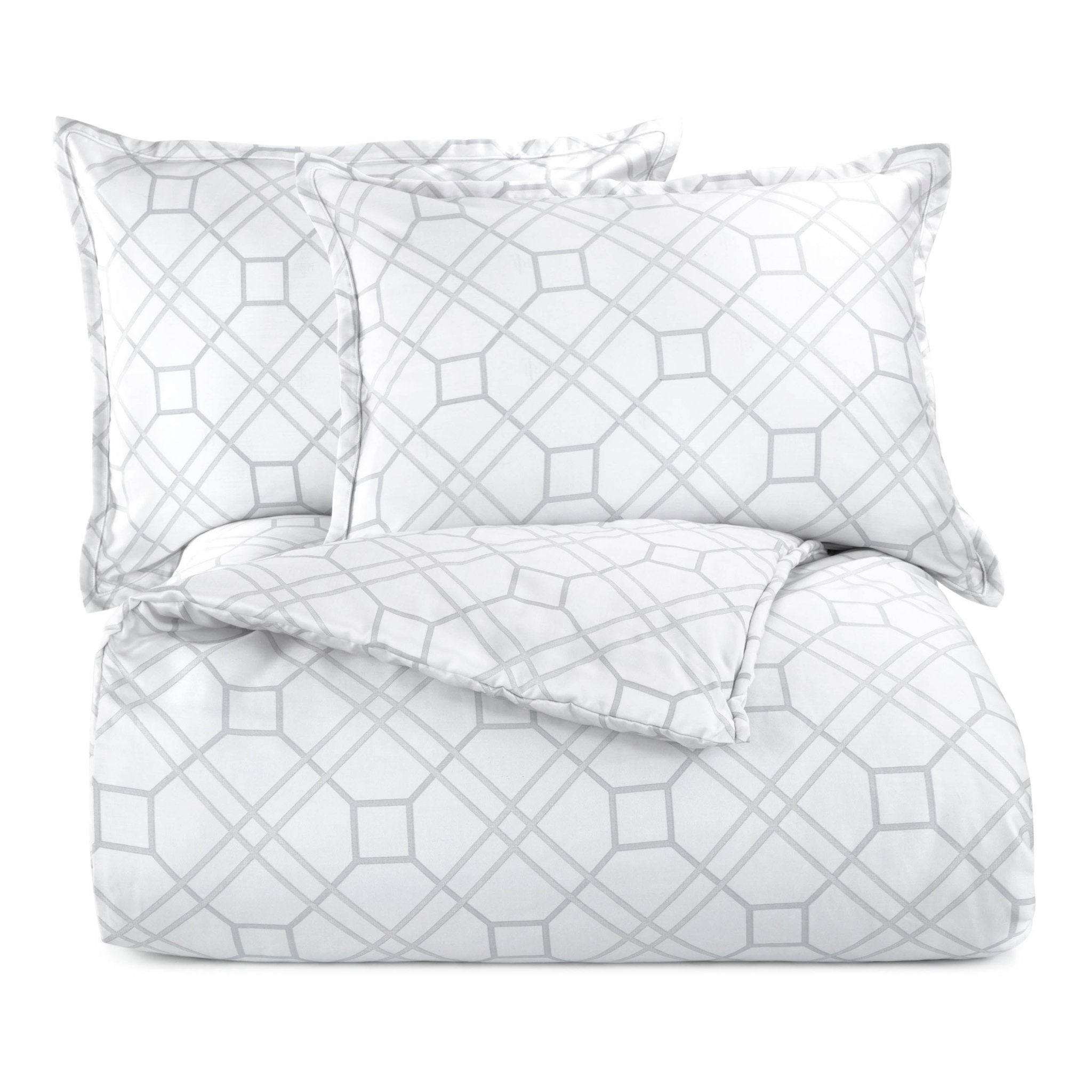 White comforter set with geometric pattern on a white background