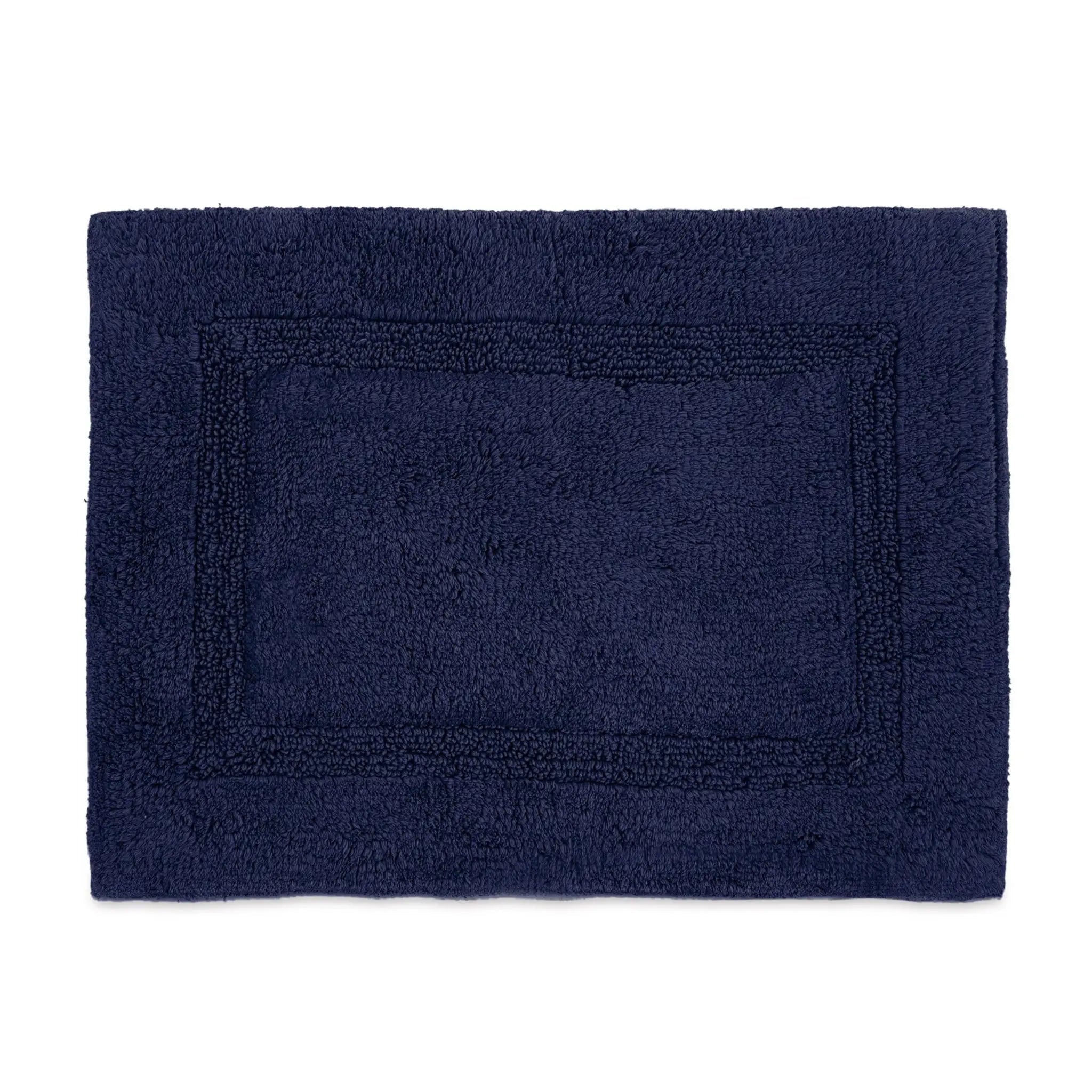 Estate blue bath rug on a white background
