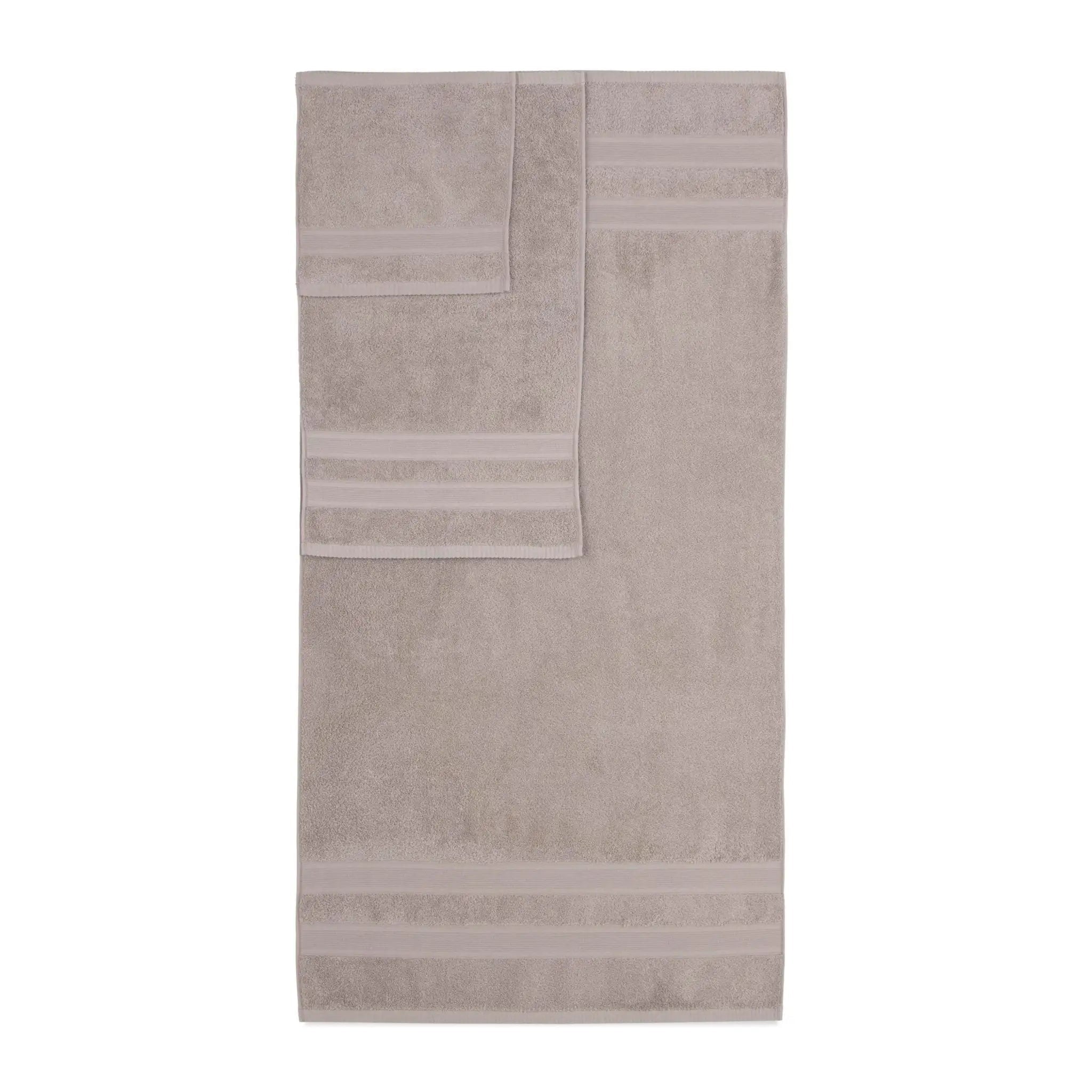 A sand-colored bath towel with horizontal striped borders, displayed flat against a solid white background.