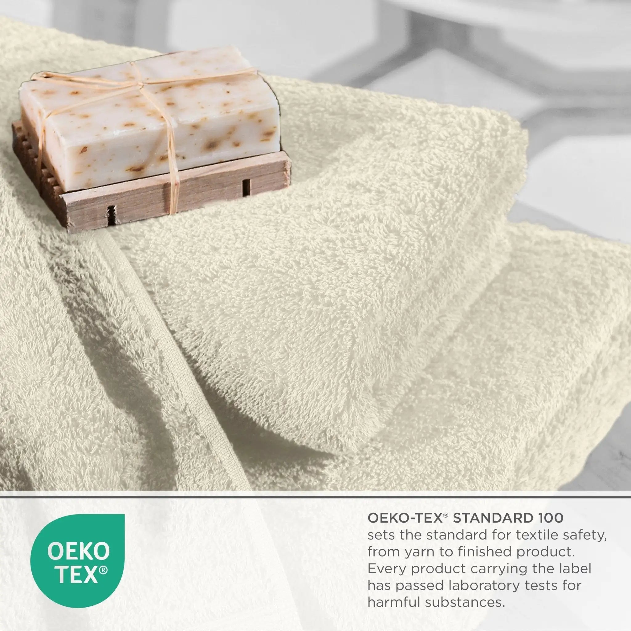 Bar of soap on a wooden soap dish with a ivory towel, featuring the OEKO-TEX logo.