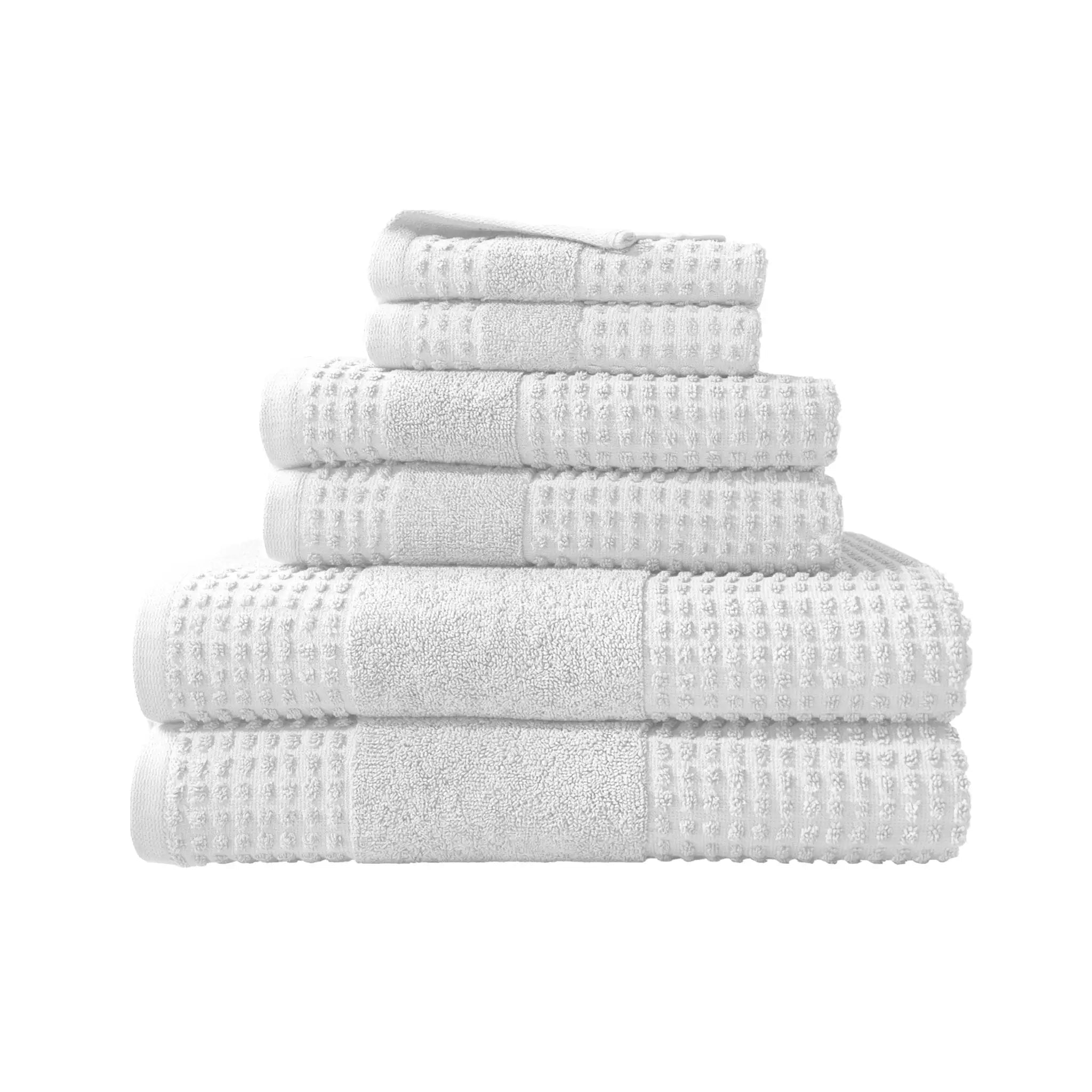 Stack of white towel set on a white background
