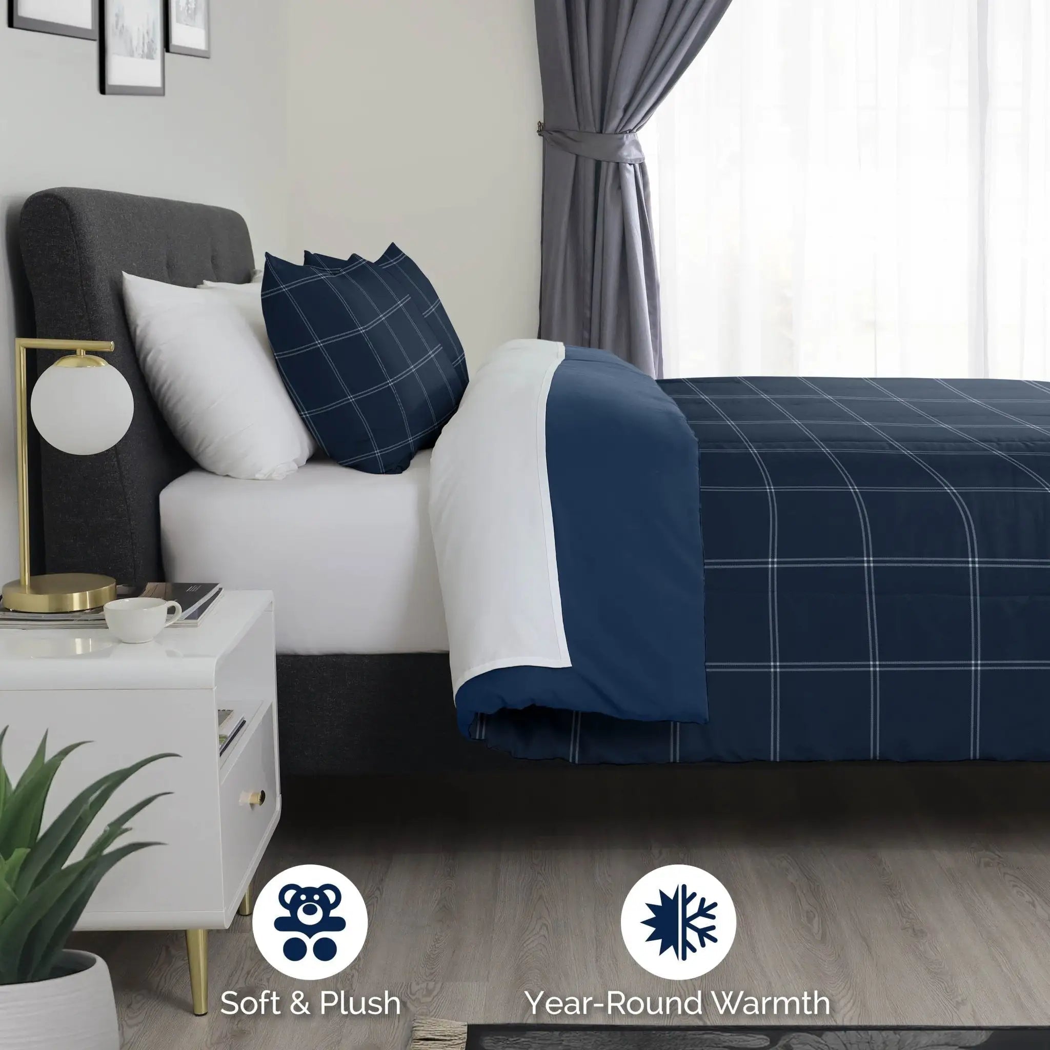 Bedroom with a bed covered in blue and white checkered comforter.