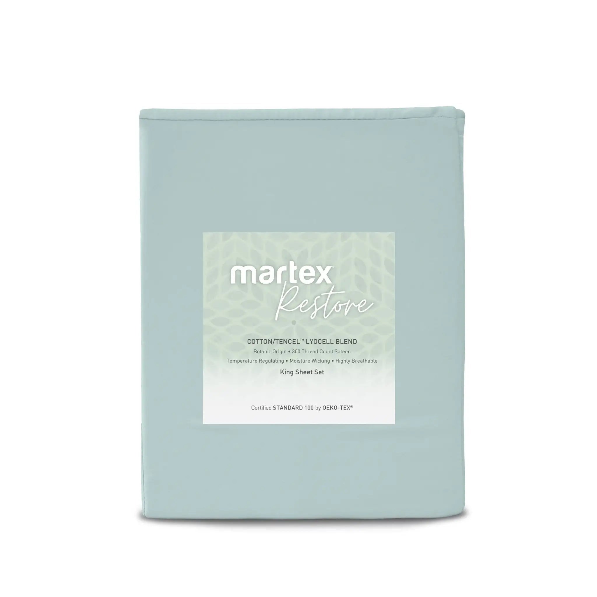 A folded light blue sheet set in a soft dust bag with a white label reading 'martex Restore' on a clean white background.