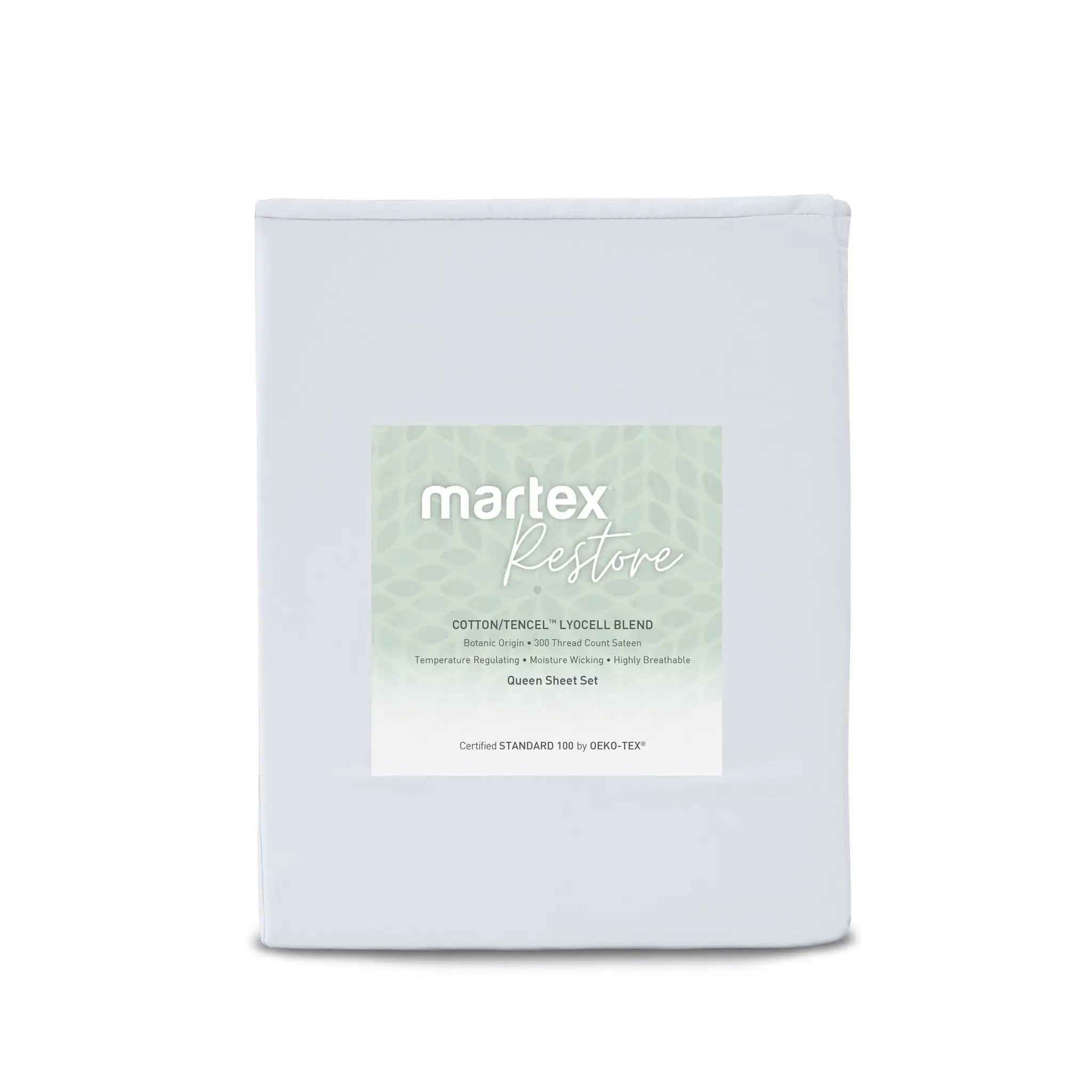 A folded white bedding sheet set package labeled 'martex Restore' with a pale green patterned label, photographed on a clean white background.