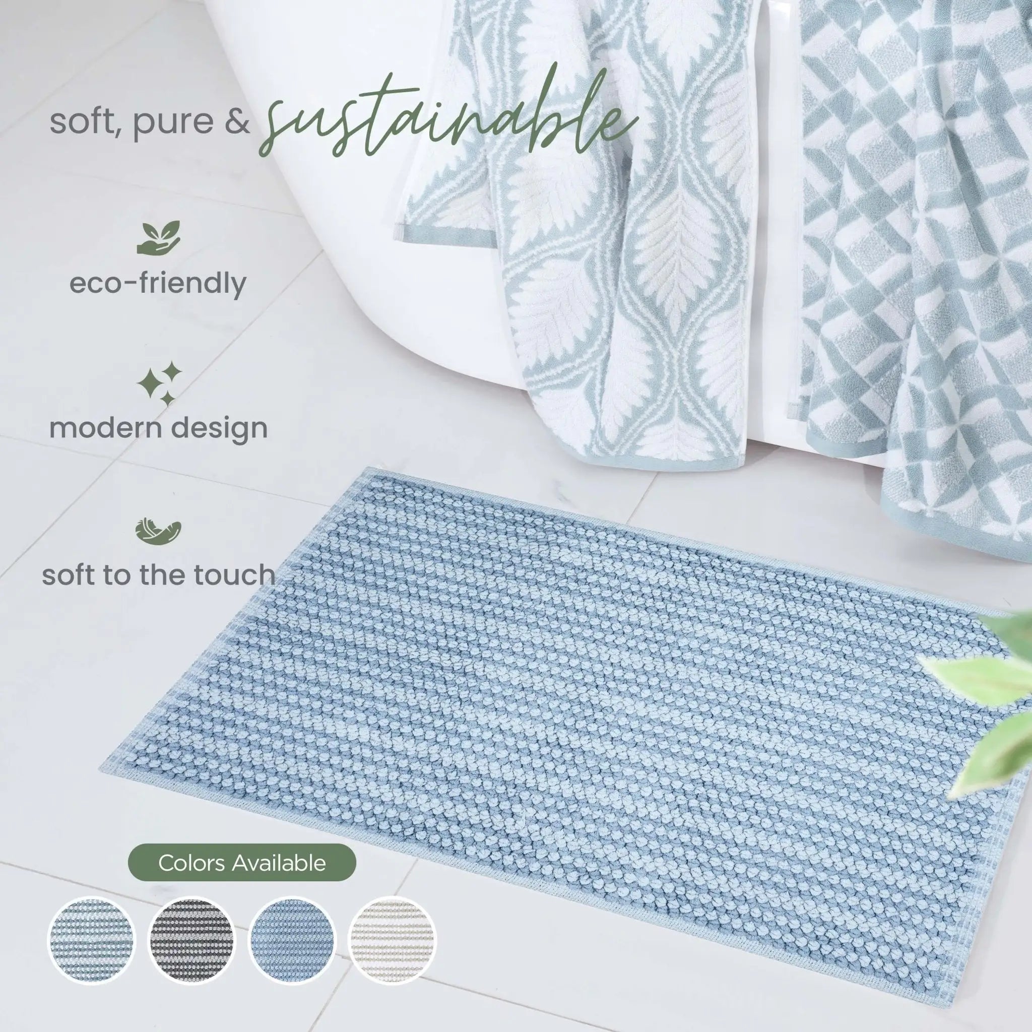 A blue textured bath rug, with patterned towels and a bathtub in the background. Text on the image highlights soft, pure, and sustainable qualities, and a 'Colors Available' section shows other color options.