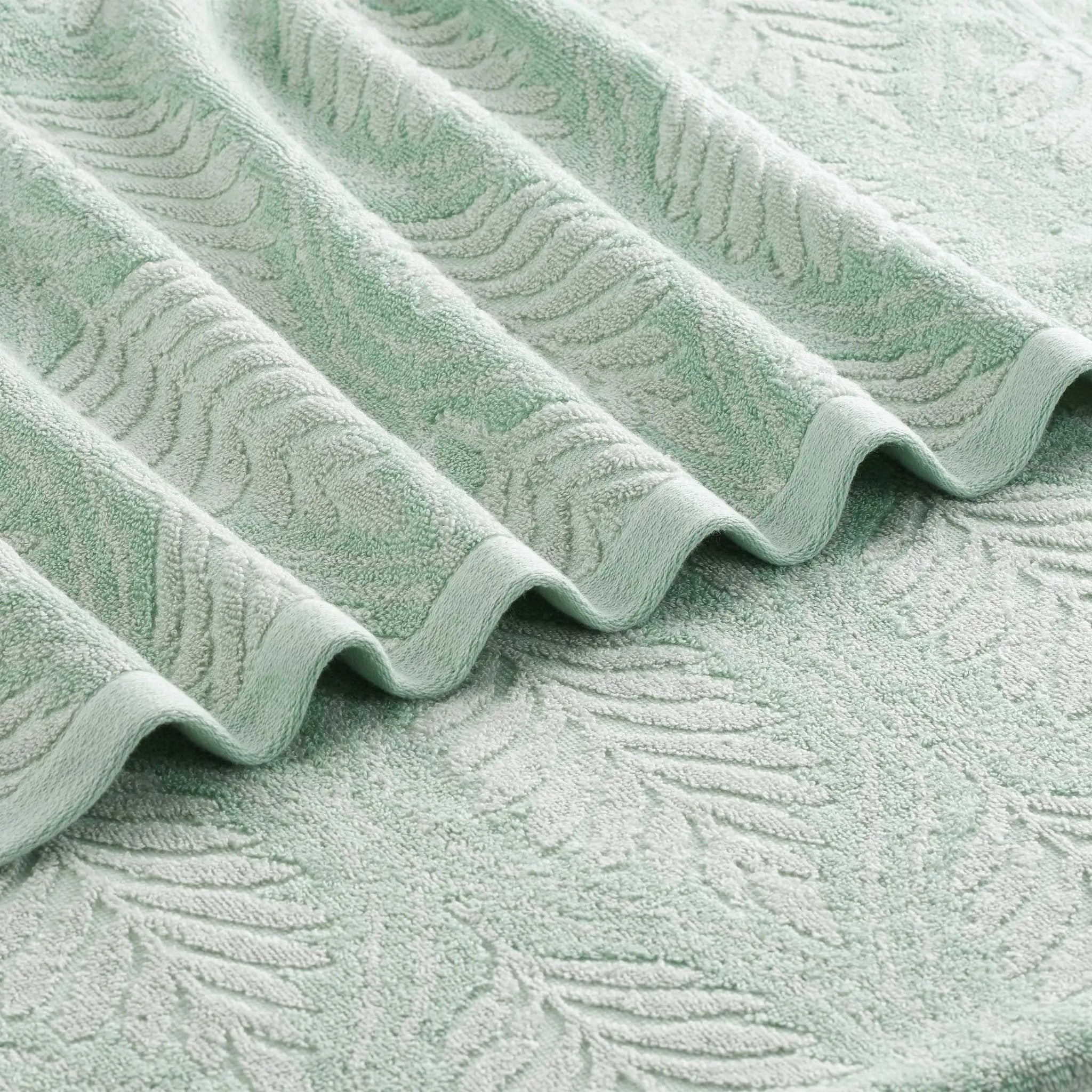 Textured sage fabric with wavy pattern