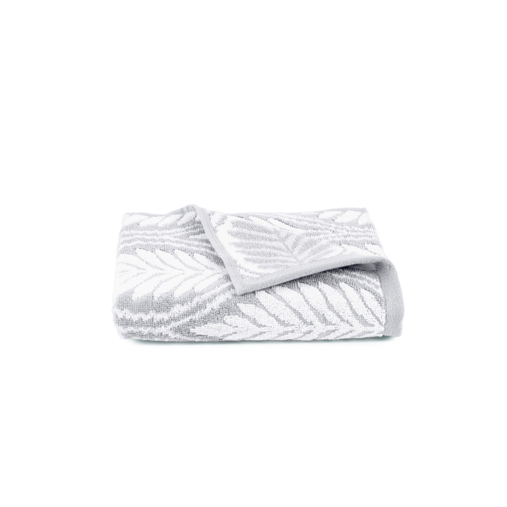 Grey textured hand towel on a white background