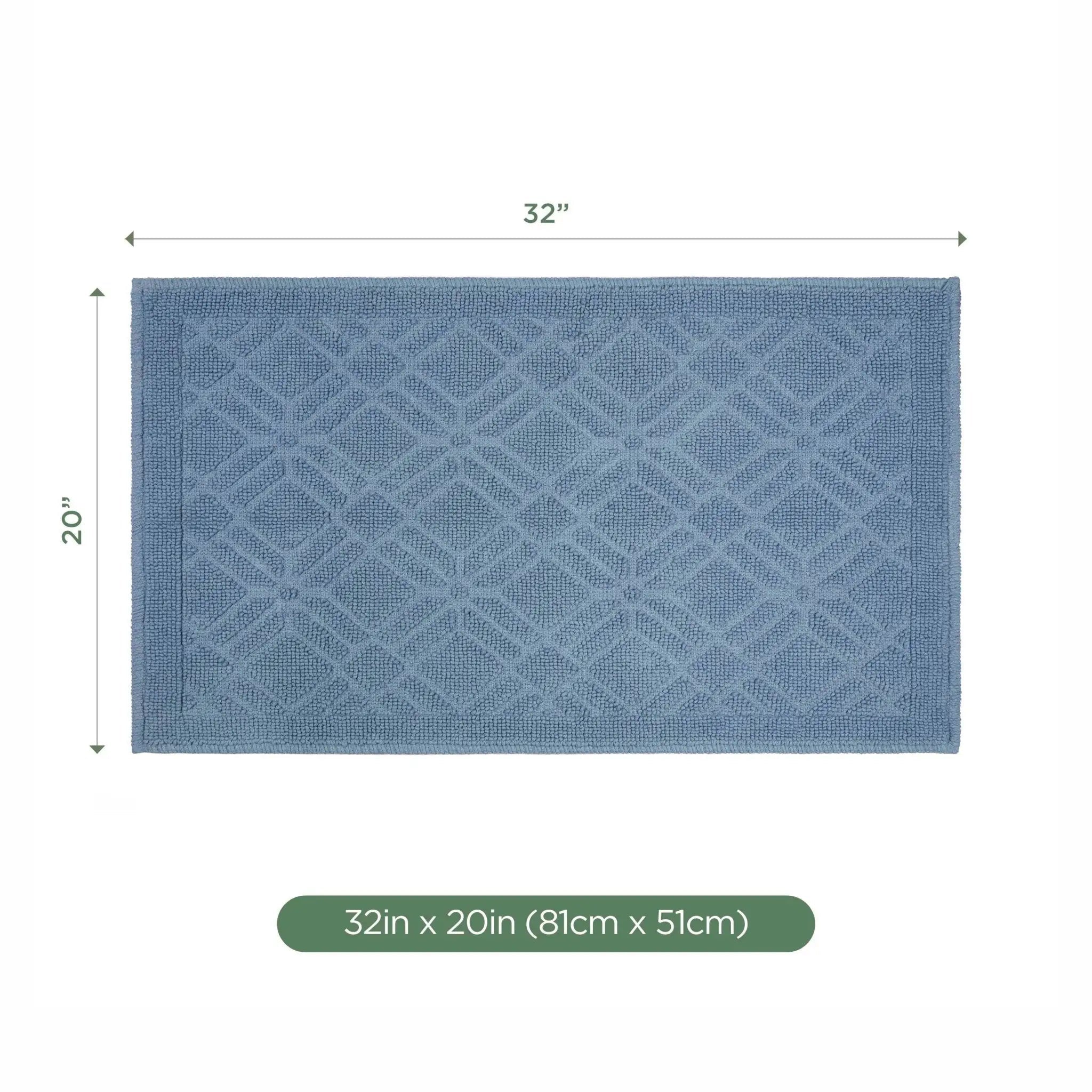 A rectangular blue bath rug with a raised diamond pattern, shown with dimension labels indicating 32 inches by 20 inches (81 cm x 51 cm) on a white background.