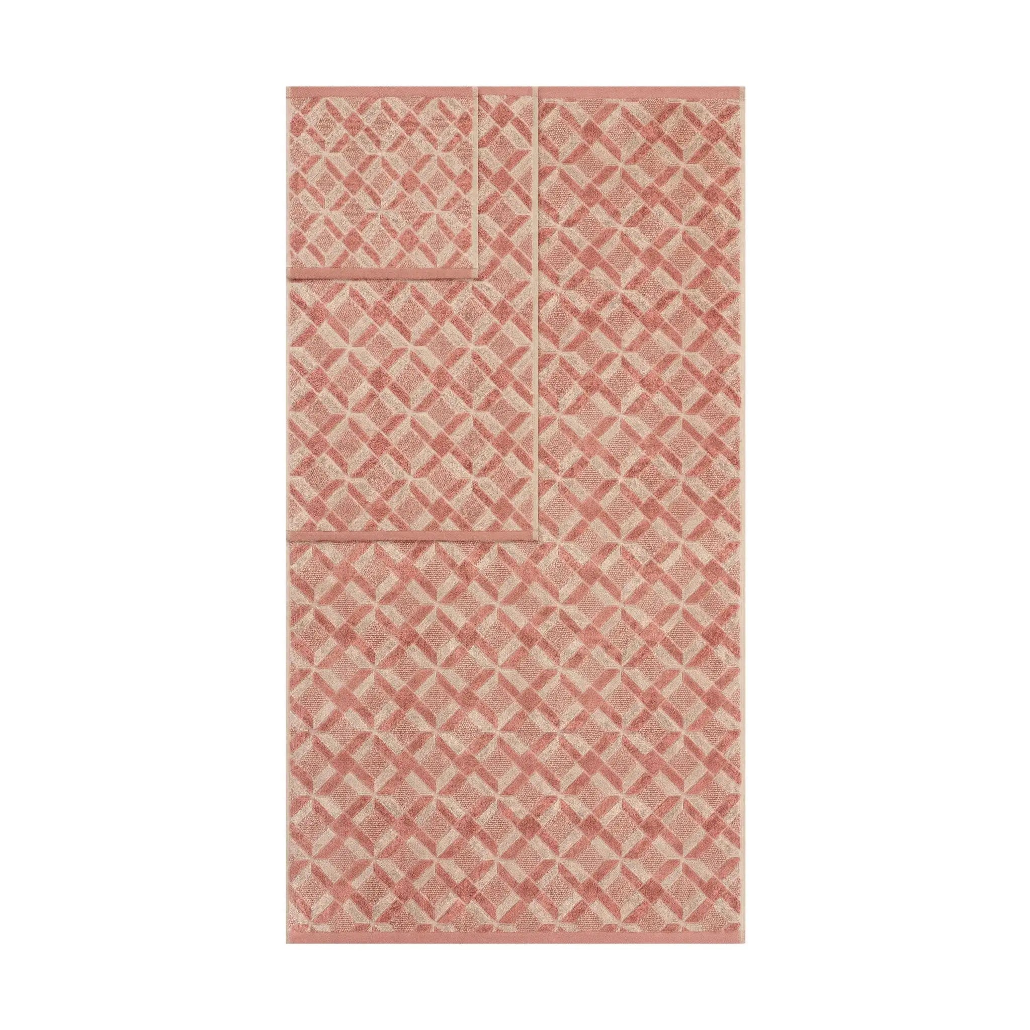 Clay colored towels on a white background