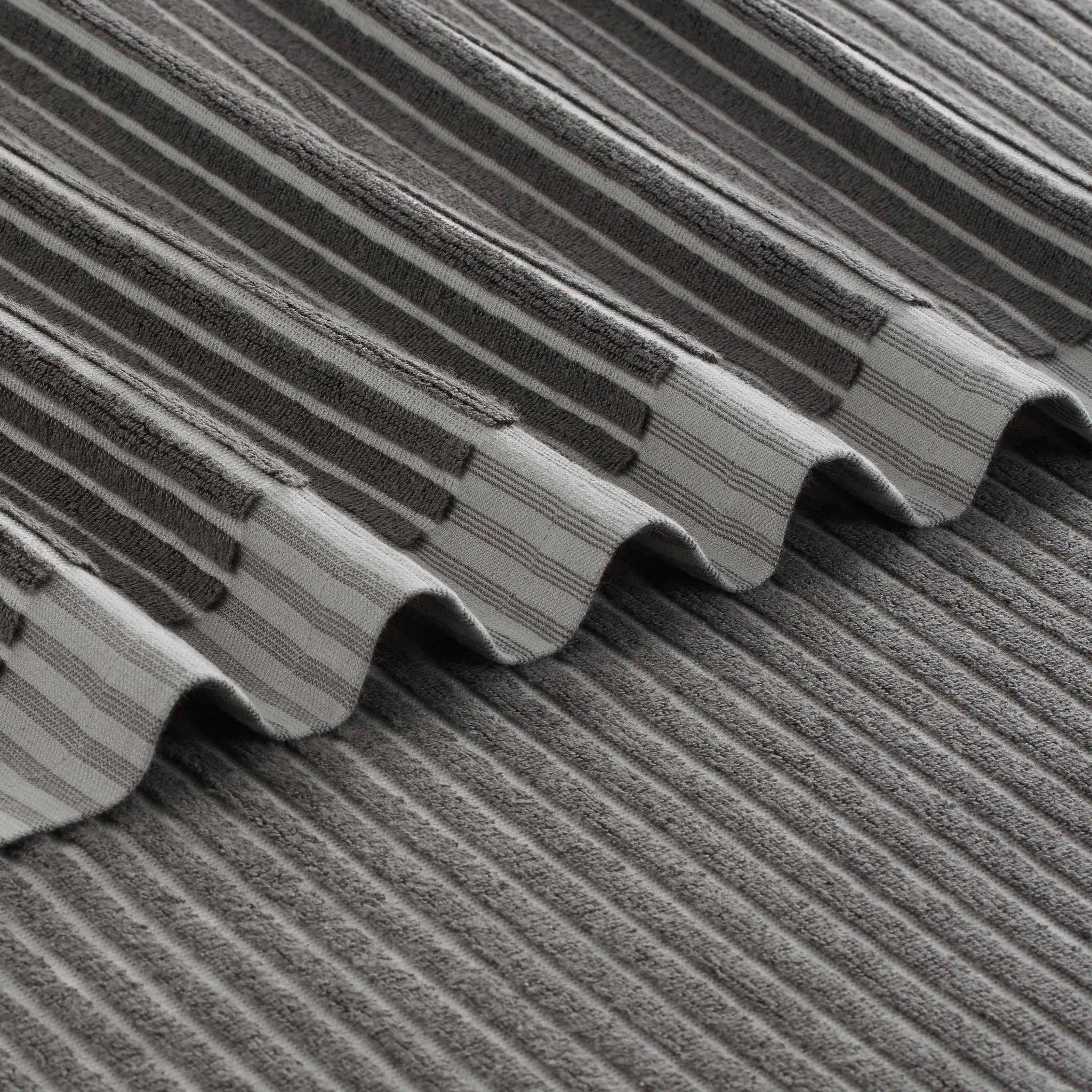 Close-up of a charcoal bath towel.