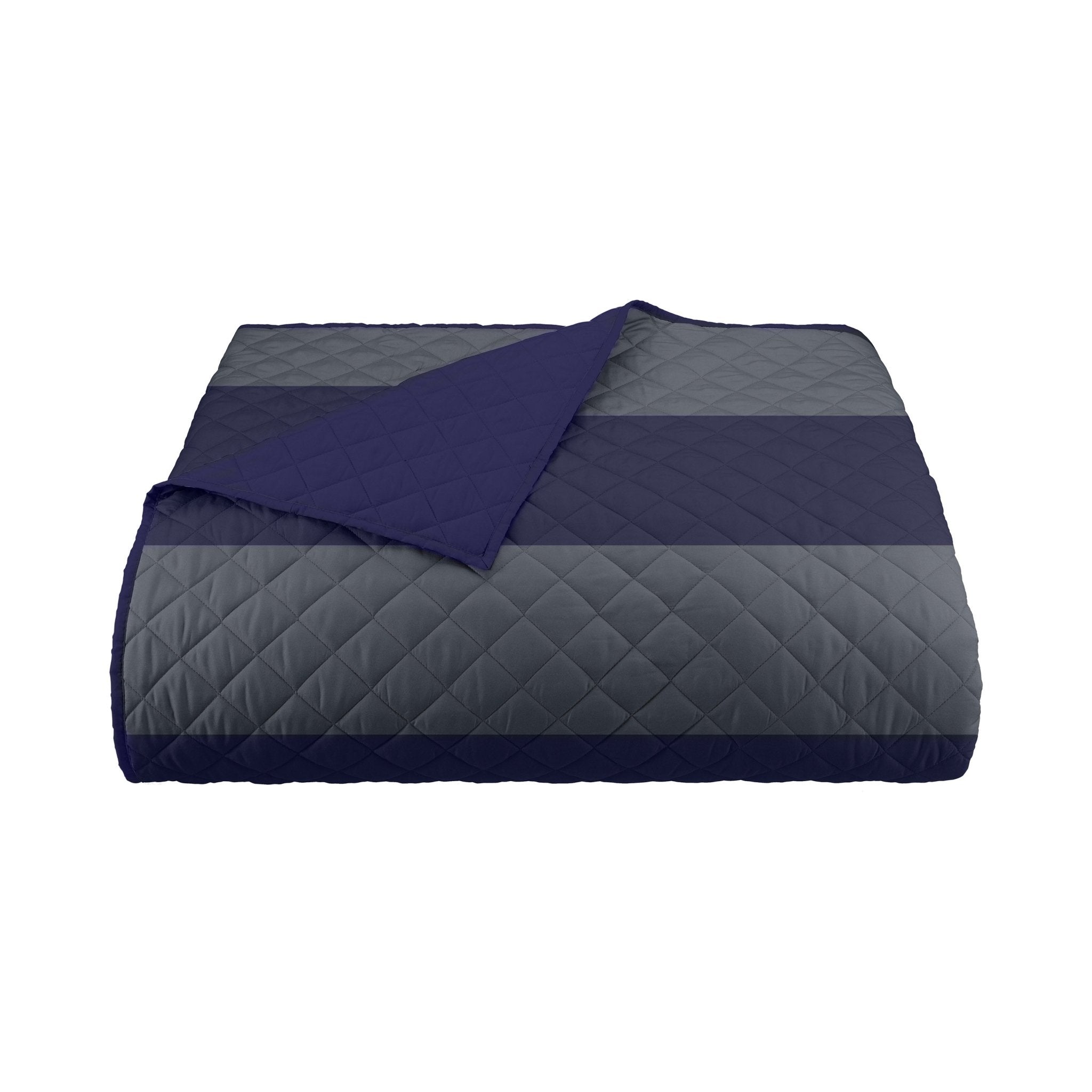 Navy and gray quilted coverlet on a white background