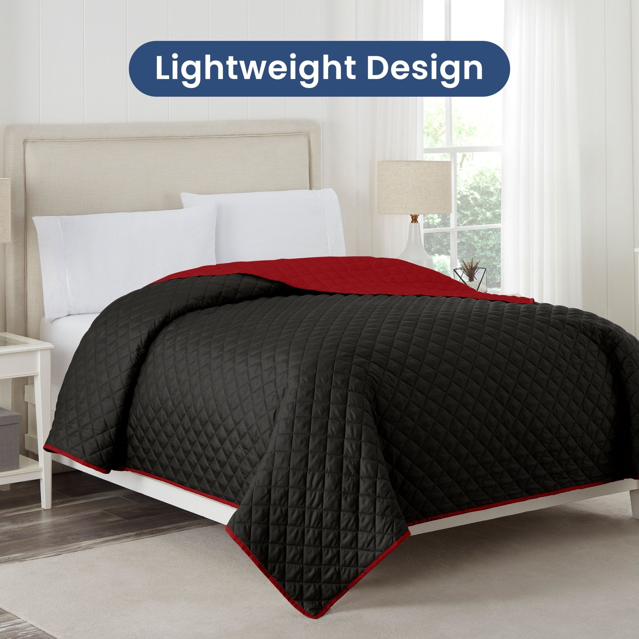 Ebony/red reversible coverlet on a bed, with 'Lightweight Design' text above.