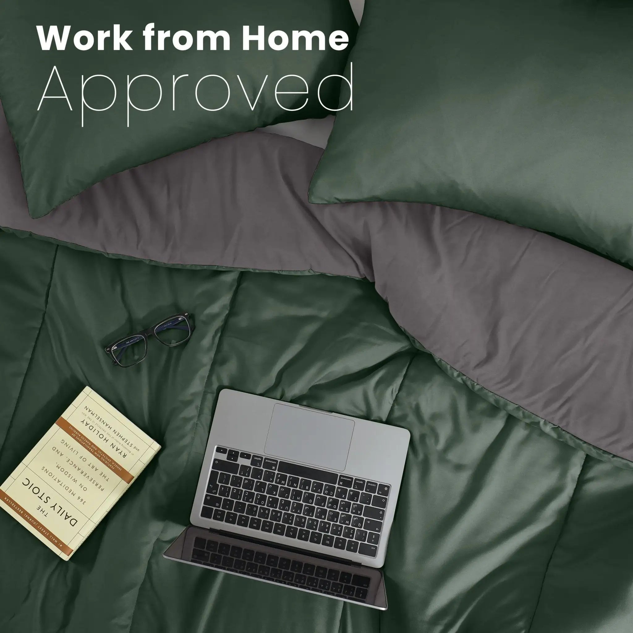 Olive and graphite reversible comforter, two pillow shams, a laptop, glasses, a book, and the text 'Work from Home Approved' overlaid at the top.