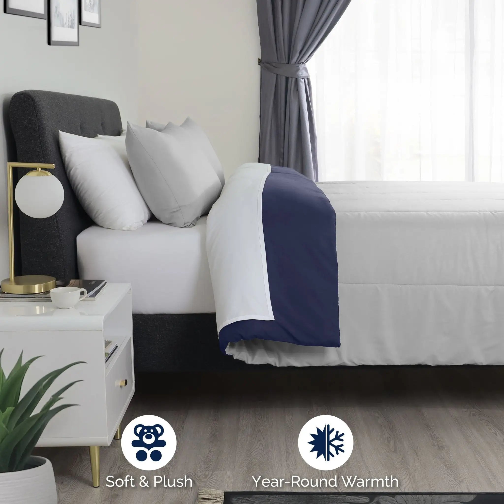 Bedroom with a light grey comforter featuring soft and plush bedding, labeled 'Soft & Plush' and 'Year-Round Warmth'.