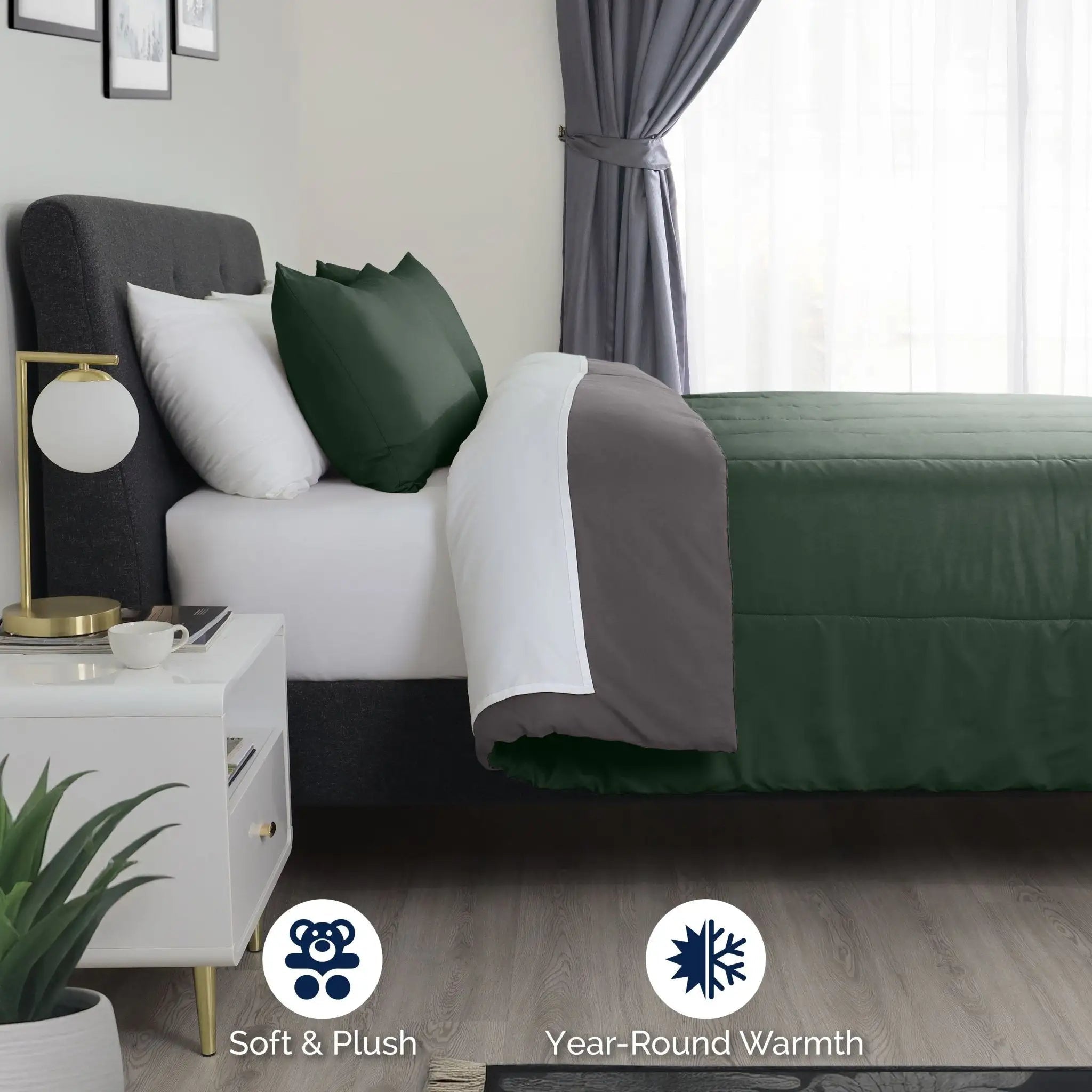 Olive color comforter with gray color reversible side, styled in a modern bedroom. Text overlays at the bottom read 'Soft & Plush' and 'Year-Round Warmth' with corresponding icons.