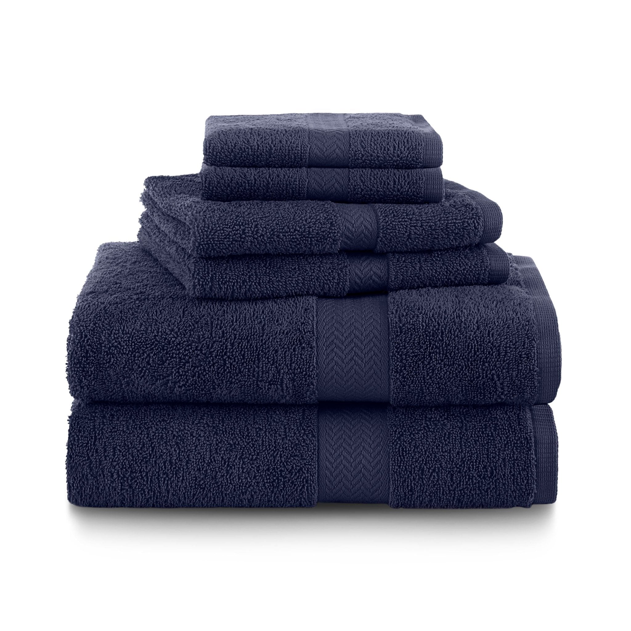 Set of navy blue towels stacked on a white background