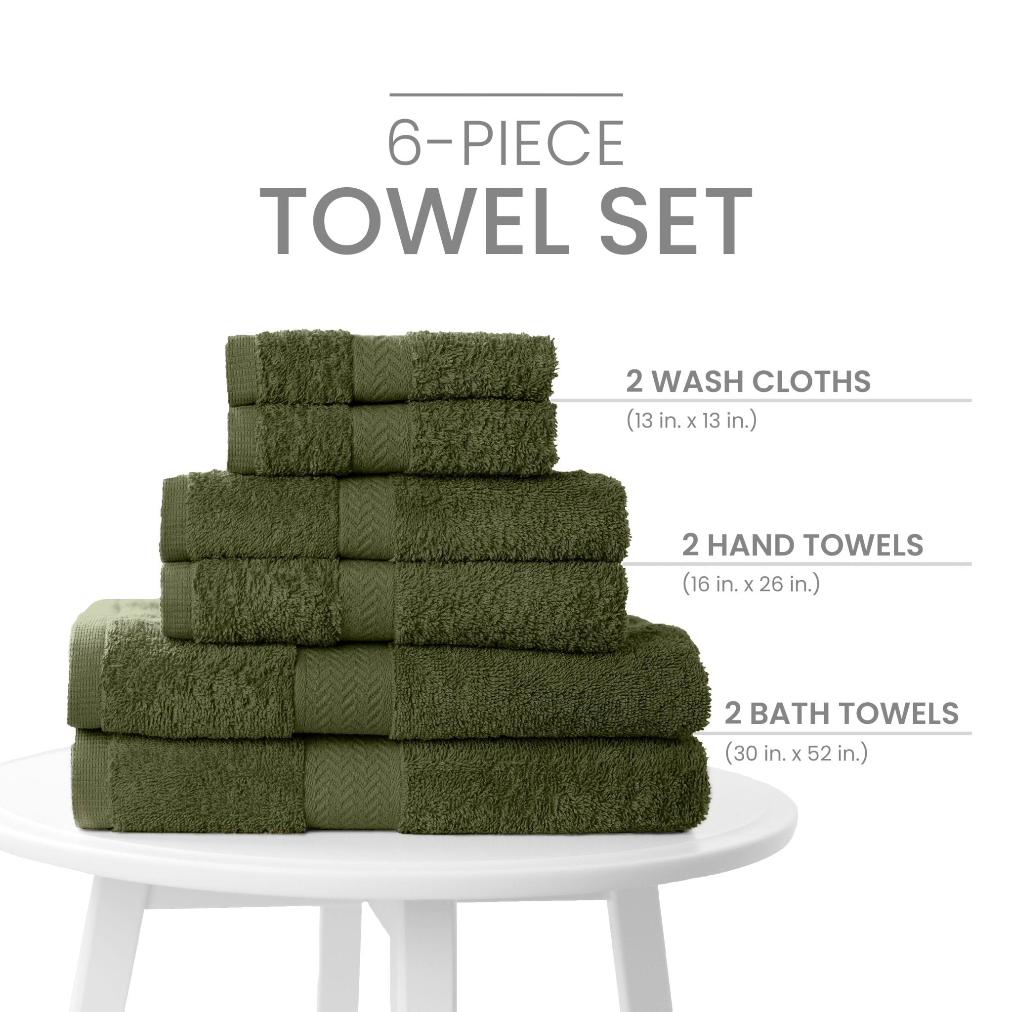6-piece towel set with dark green towels on a white table against a white background